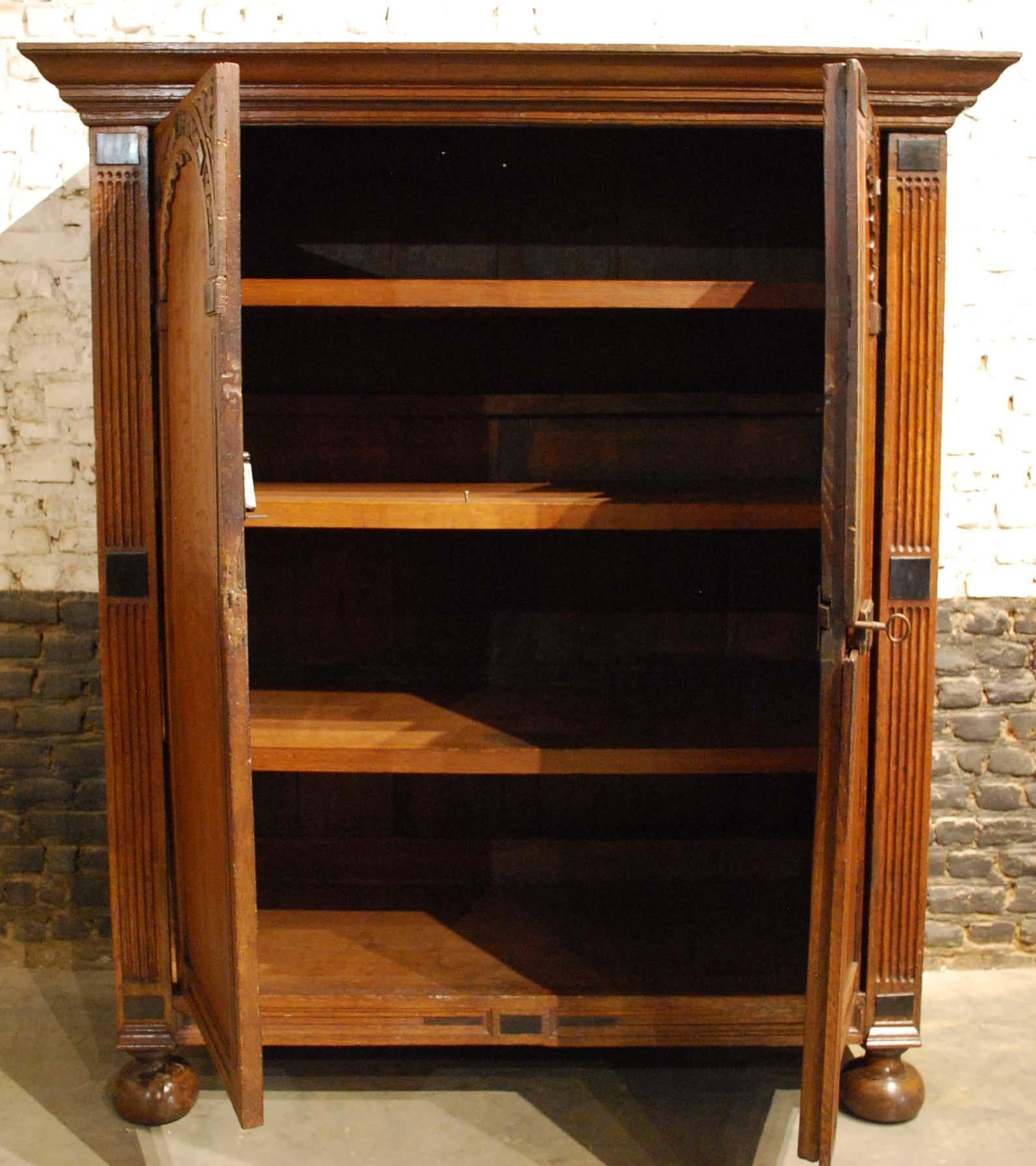 Antique 17th Century Oak and Ebony Two-Door Renaissance Cabinet In Good Condition For Sale In Casteren, NL