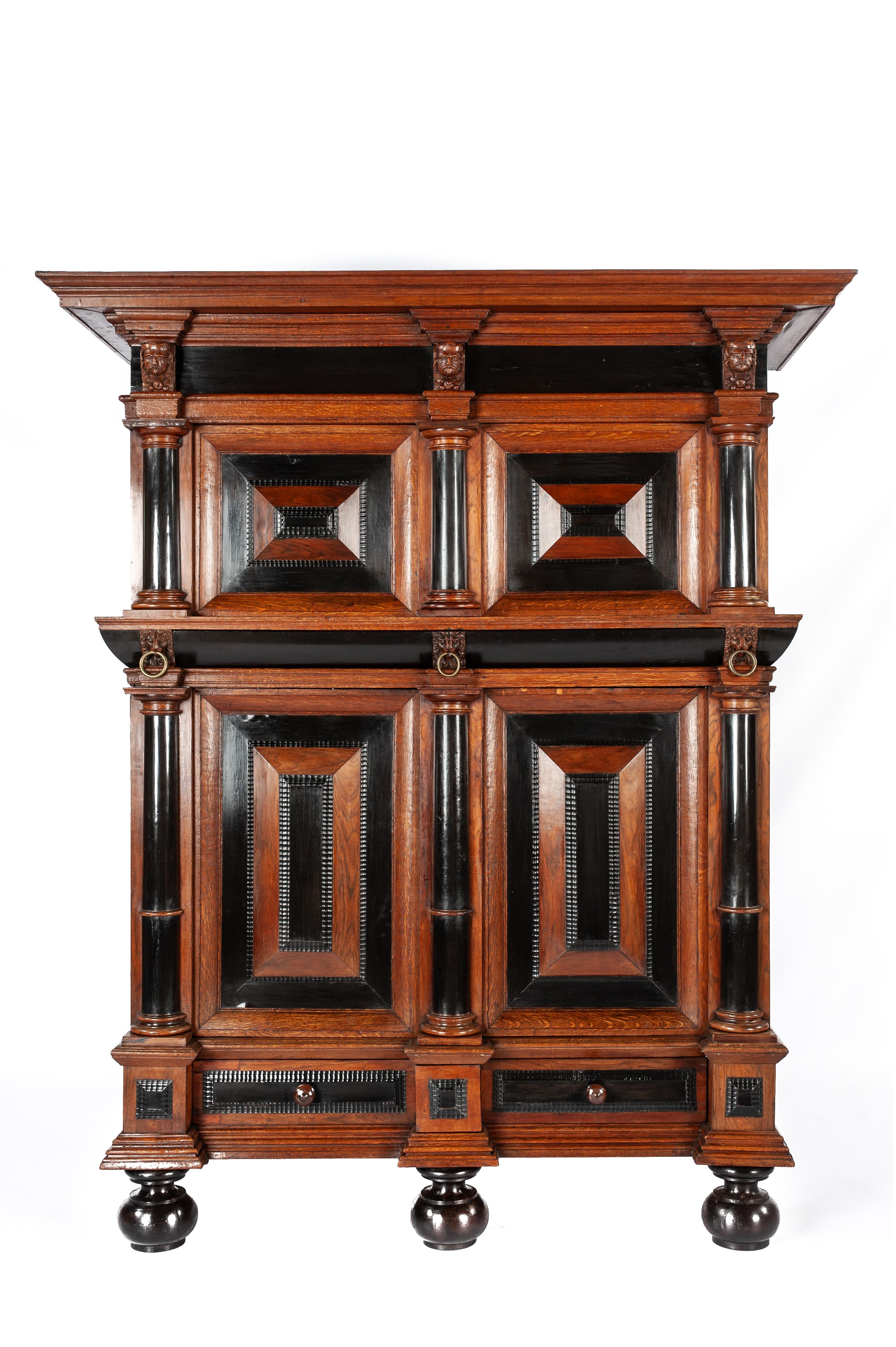 On offer here is an antique four-door cupboard, in Dutch, named “Kussenkast”, that was made in the Northern Netherlands in the late 17th century. This cupboard takes its name from the pillow-shaped thickenings on the doors. The doors are flanked by