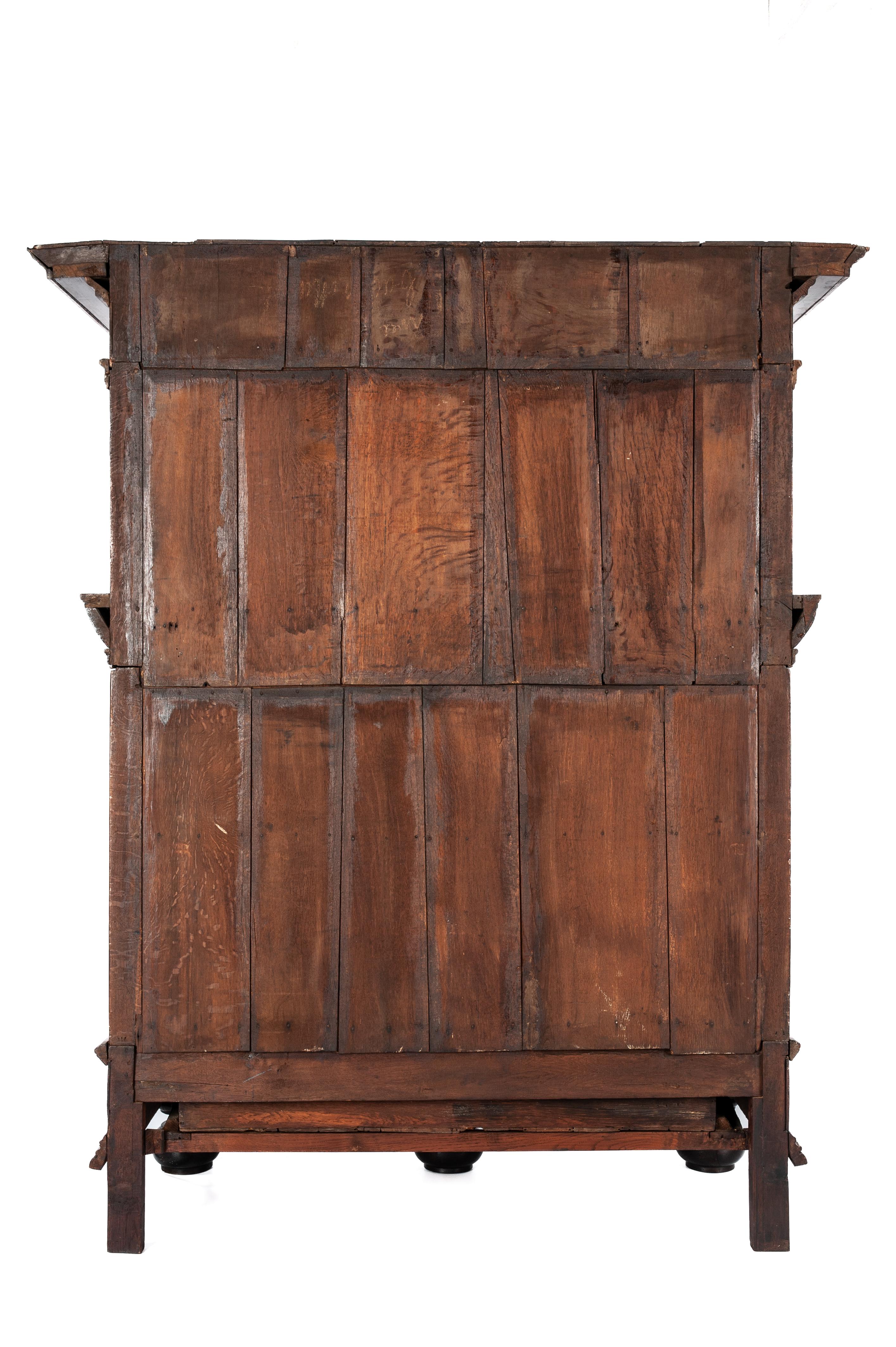 Hand-Carved Antique 17th Century Oak Dutch Renaissance Cabinet with Ebony and Mahogany For Sale