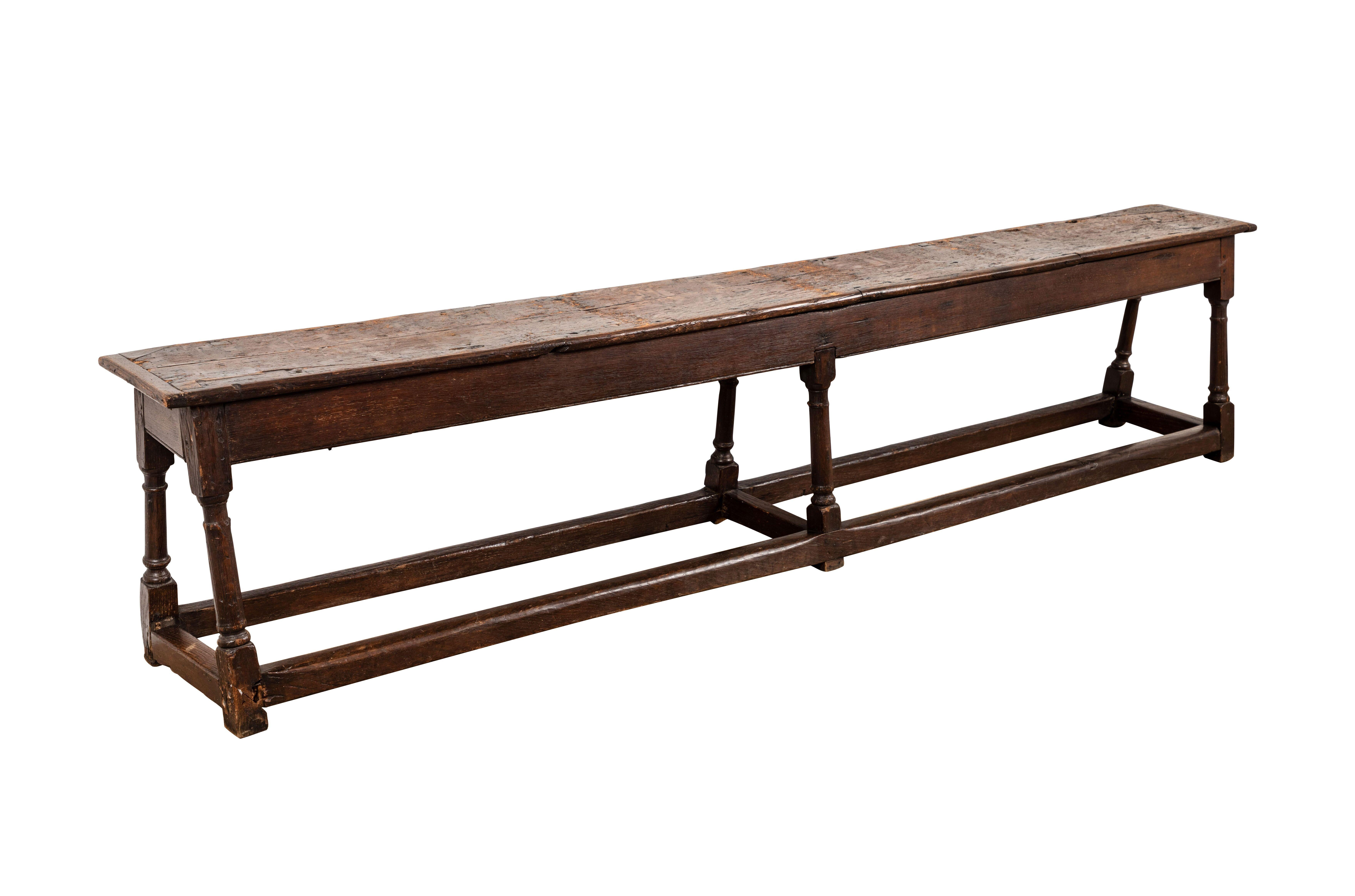 Antique 17th century wooden bench, English
Measures: 88” L x 10” D x 19” H.
   
