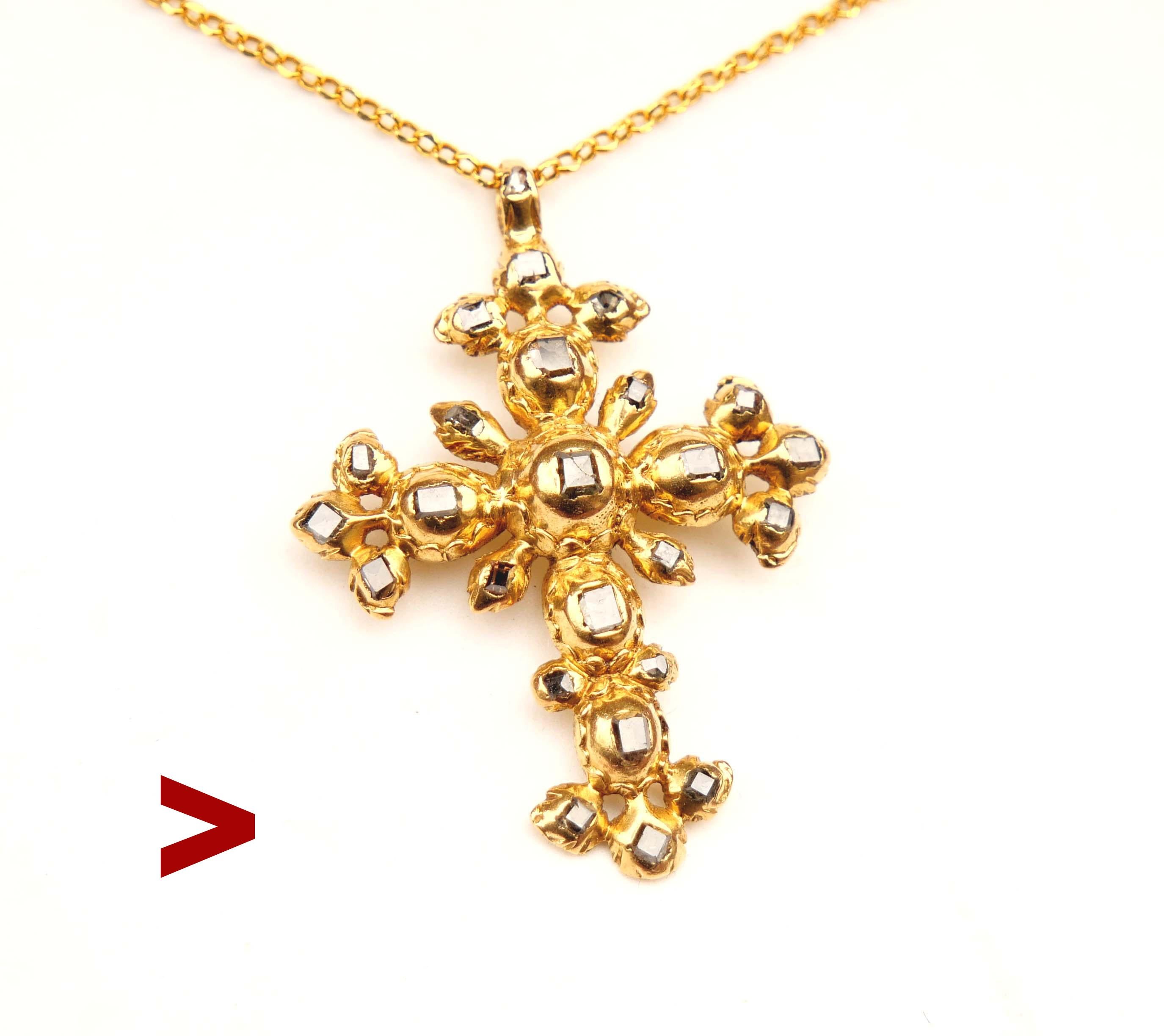 Very rare ca. early 17th century likely Italian or Spanish 19K Yellow Gold Cross Pendant with 24 Diamonds, all of table cut about 2 ctw. Hand - engraved decorations on the back side. Back side is a bit concave for best fit on the chest.

Metal