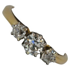 Antique 18 Carat Gold and 0.65 Carat Old Cut Diamond Trilogy Ring