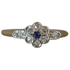 Antique 18 Carat Gold Platinum Sapphire and Diamond Daisy Cluster Ring