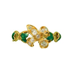 Antique 18 Carat Gold Ring with a Diamond Fleur De l
ys and Green Enamel Ivy