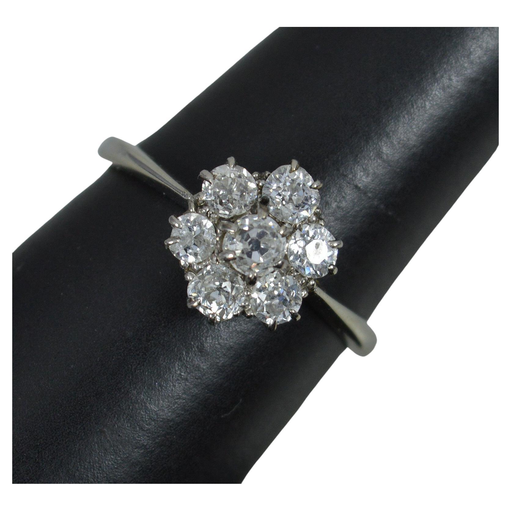 Antique 18 Carat White Gold and 0.8 Carat Old Cut Diamond Daisy Cluster Ring For Sale