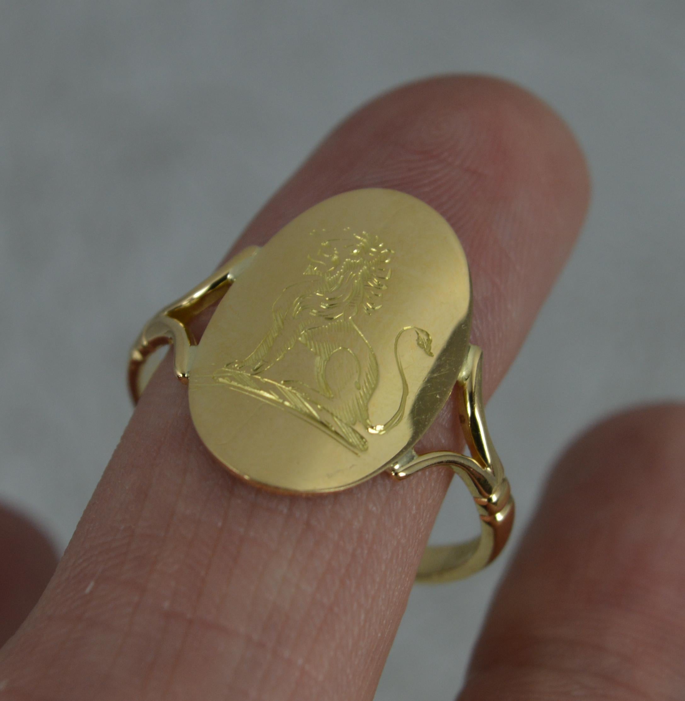 Women's or Men's Antique 18 Carat Yellow Gold Sitting Lion Engraved Signet Ring
