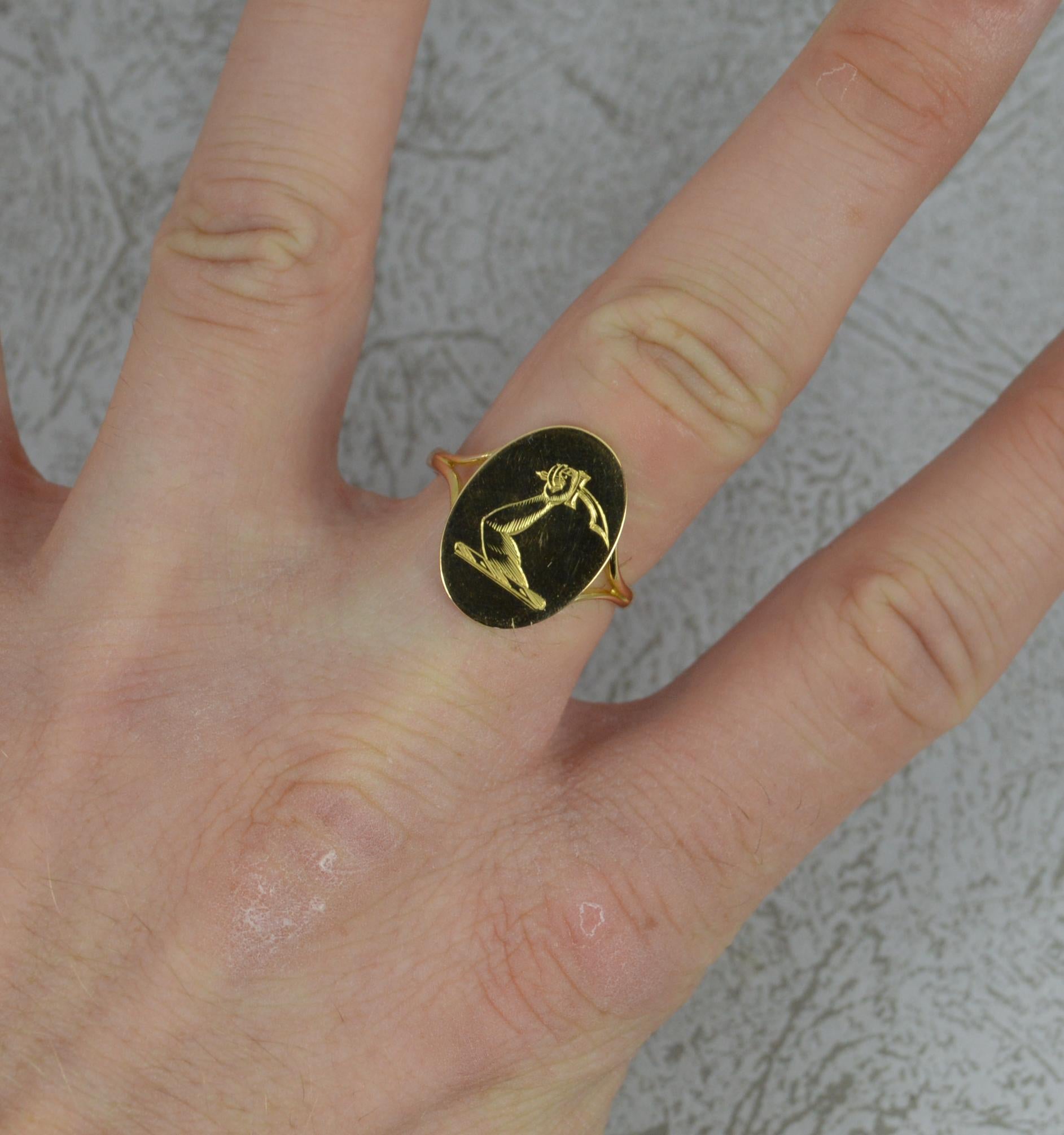 A superb unisex antique signet ring.
Solid 18 carat yellow gold example.
Designed with an arm holding a sword.
13mm x 18mm oval front and sits very close to the finger.

CONDITION ; Very good. Clean solid shank. Crisp intaglio. Expertly converted