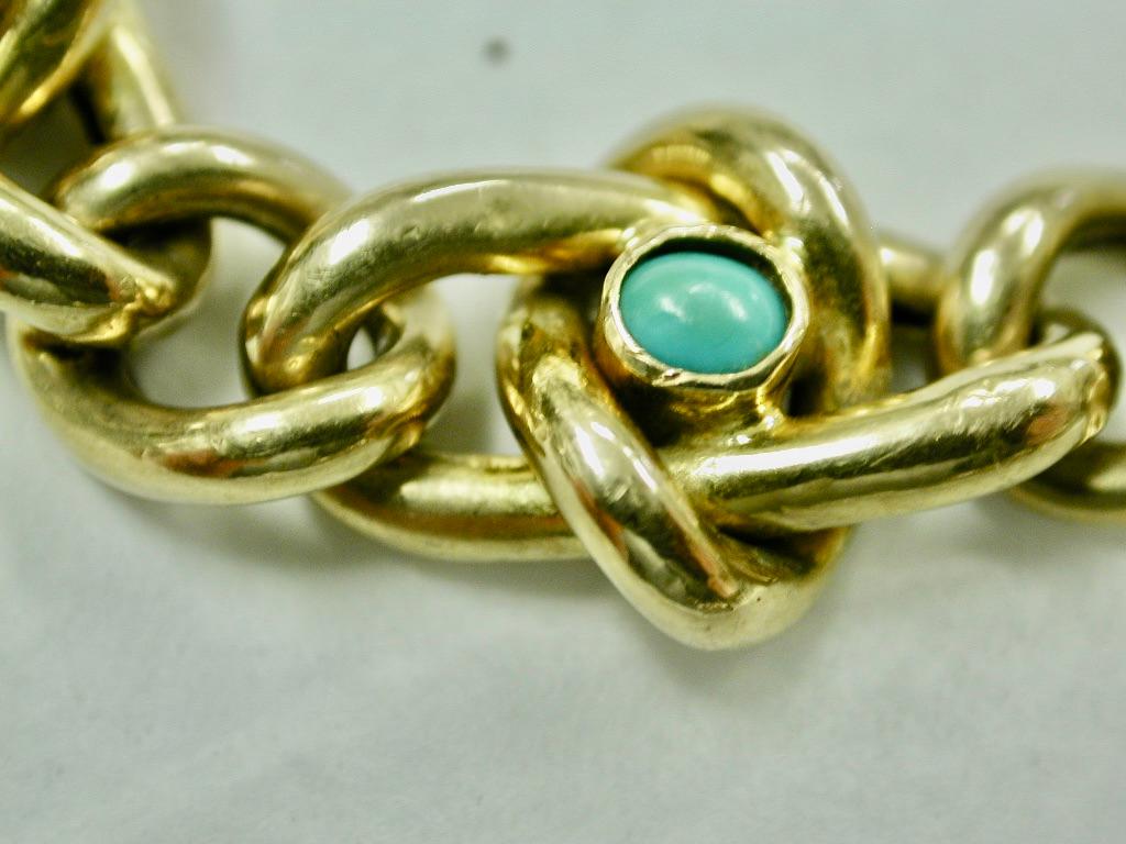 Antique 18 Ct Gold & Turquoise Hollow Curb Bracelet Dated Circa 1900
Unusual to find this bracelet made in 18 Ct Gold and is marked either side of the Bolt Ring
This is curb link is a bit different from usual with alternate links knotted and the