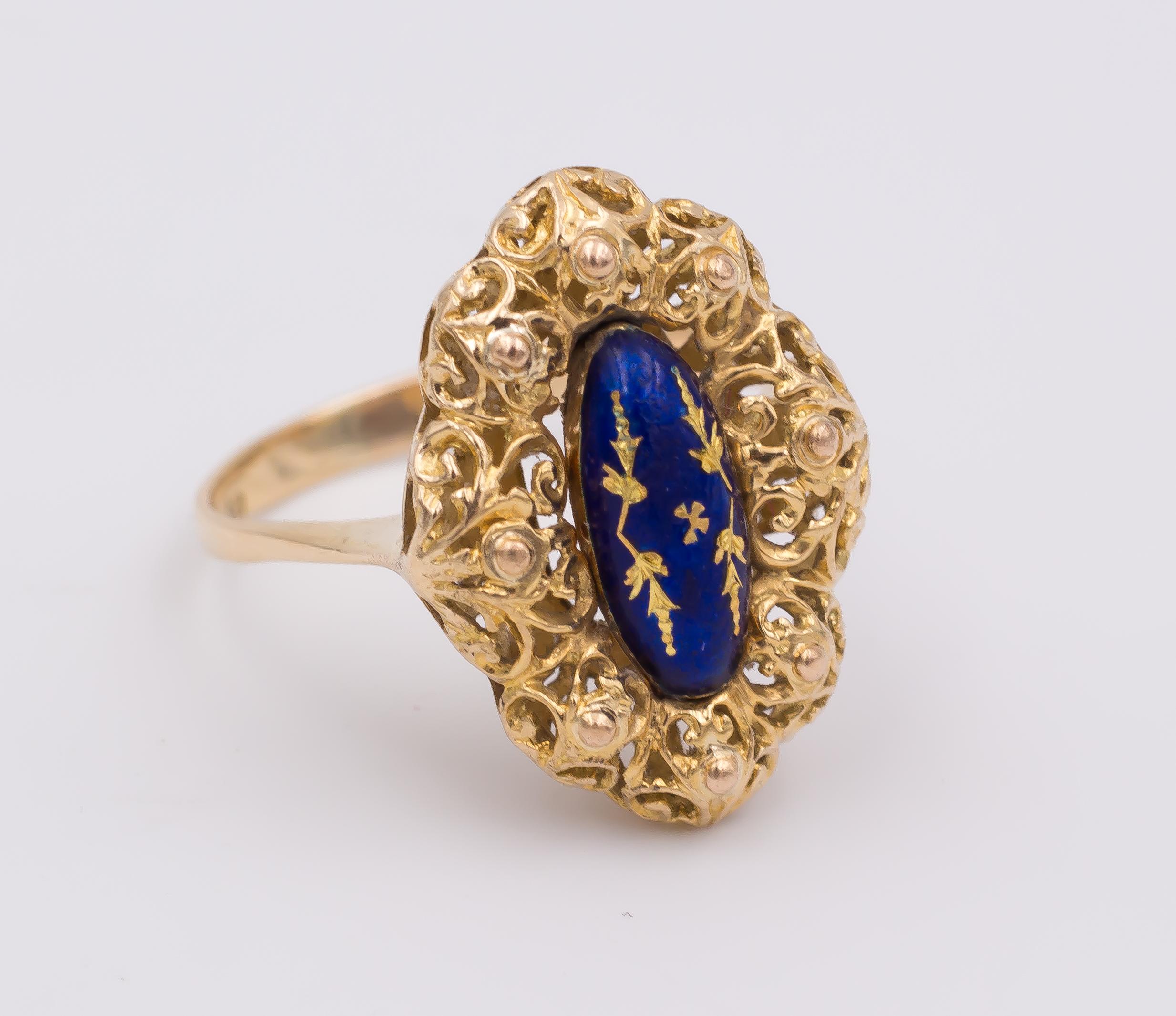 An antique ring, dating from the 1940s: it features a very interesting shape, with a full profile, where the head of the ring is set with beautiful openworks throughout; the central part of the ring is decorated with a blue enamel, that is carved to