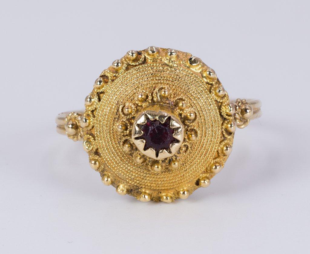 This antique ring, dating from the early 20th Century, has a real 