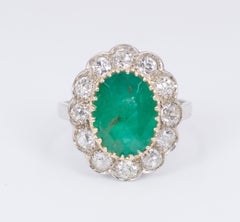 18 Karat Gold, Emerald '4ct' and Diamond '2.3 Carat' Cluster Ring, 1930s-1940s