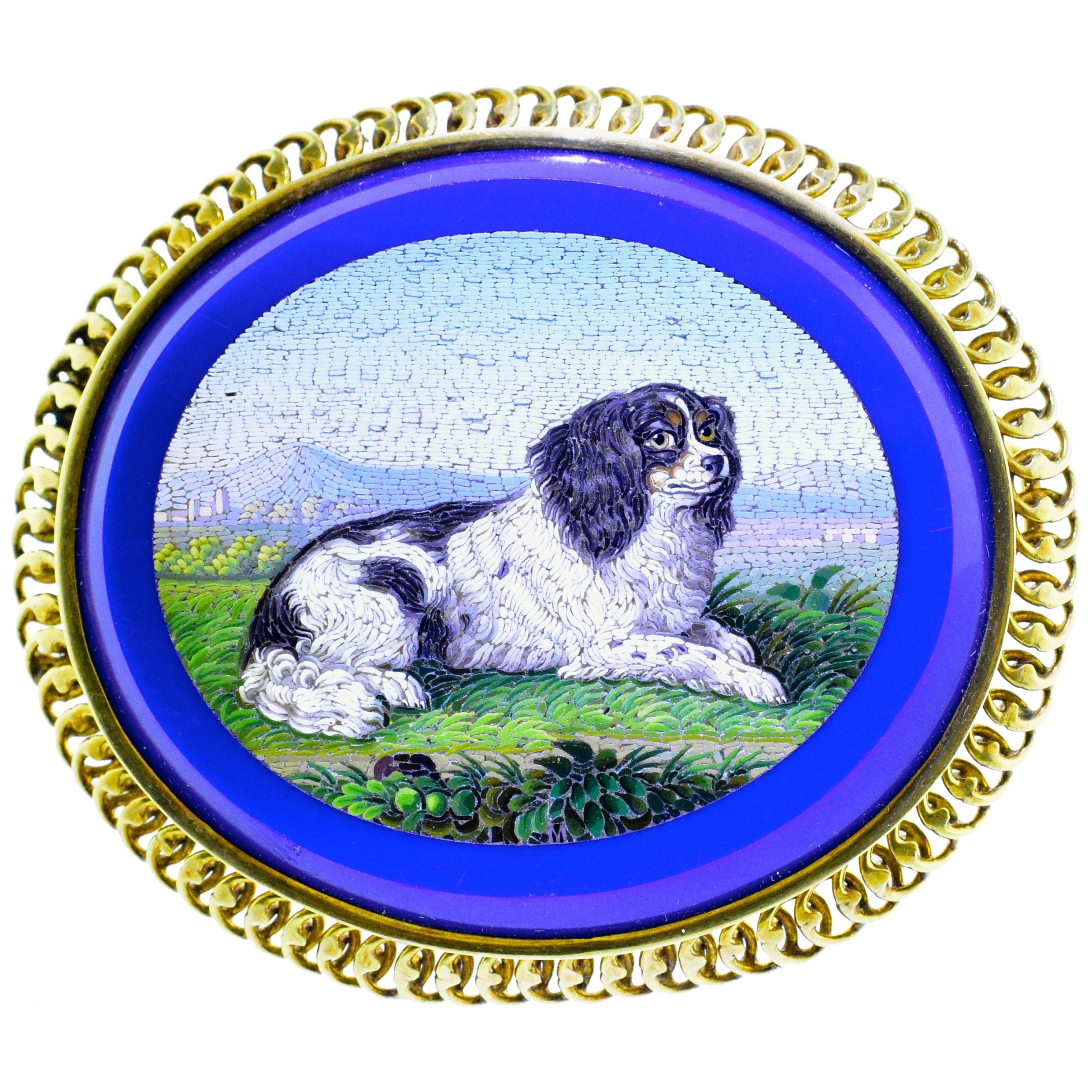 19th century antique brooch of micro-mosaic with very fine detail.  Notice the background of shaded mountains, the fine detail of the dog's fur and the foreground of vegetation.  Extremely well done, large and robust with a blue stone background