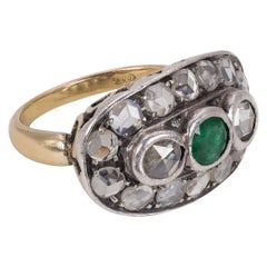 Antique 18 Karat Gold, Silver, Diamond and Emerald Oval Cluster Ring, Early 1900