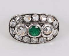 Antique 18 Karat Gold, Silver, Diamond and Emerald Oval Cluster Ring, Early 1900