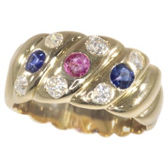 Antique 18 Karat Gold Victorian Diamond Sapphire and Ruby Engagement Ring, 1880s