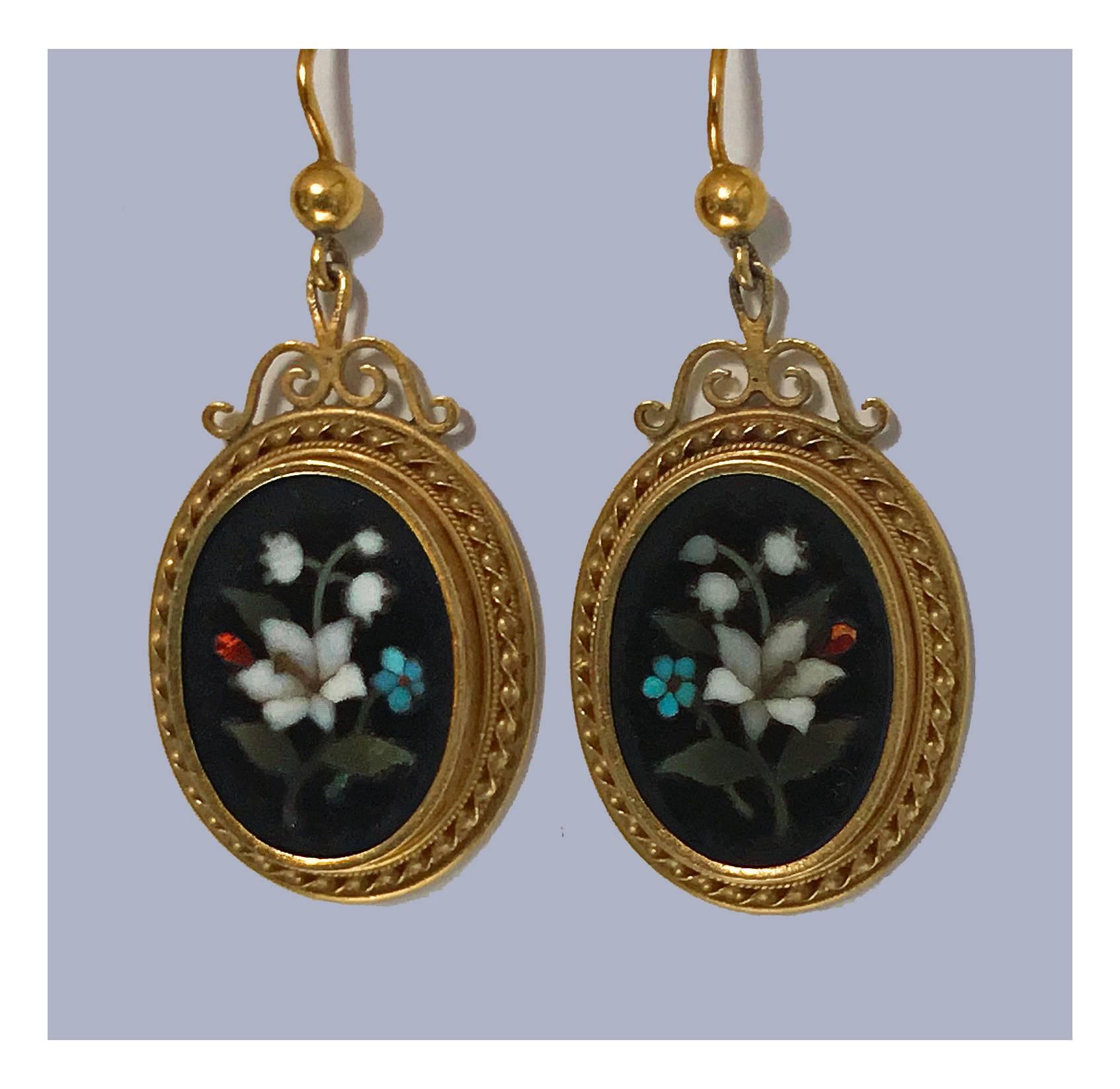 Pair of antique 18-karat Pietra Dura earrings, circa 1875. Each of oval drop form, Fine Pietra Dura floral white, blue, red, lilac inlay colours, the surround gold mount Etruscan rope design, shepherd hook fitments, stamped with continental marks.