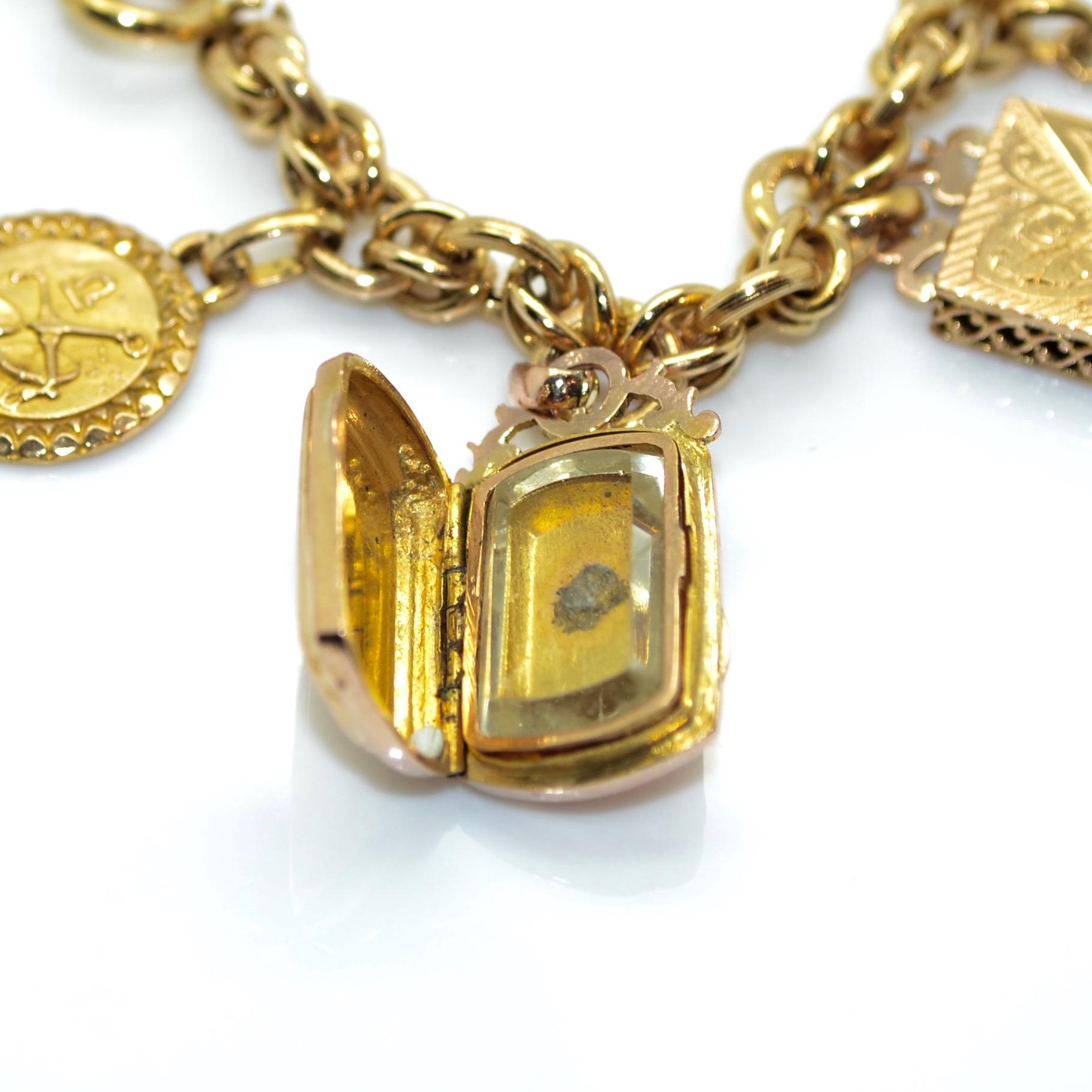 Antique 18 Karat Yellow Gold Charm French Bracelet For Sale 1