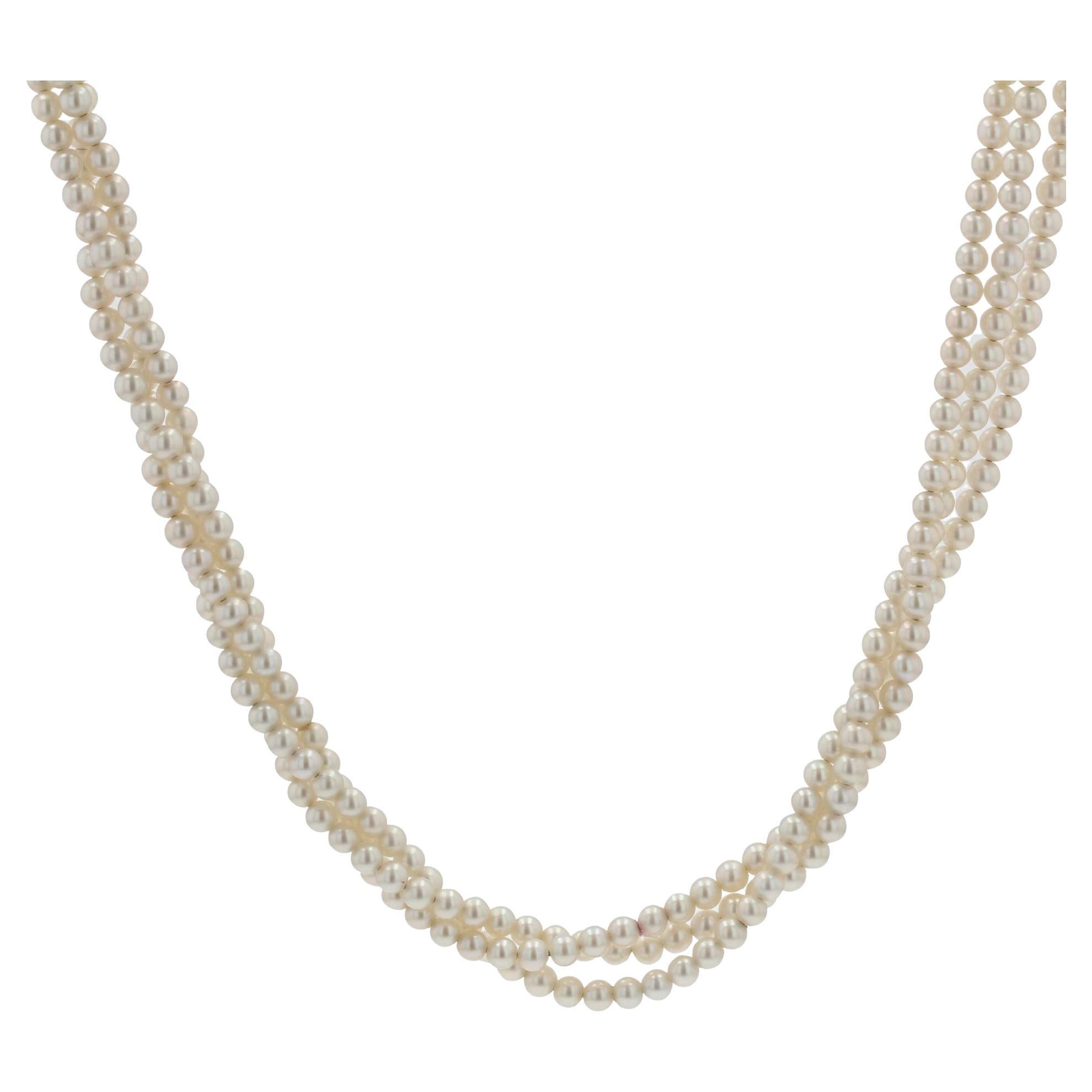 Collier ancien en or jaune 18 carats à trois rangées de perles de culture en vente