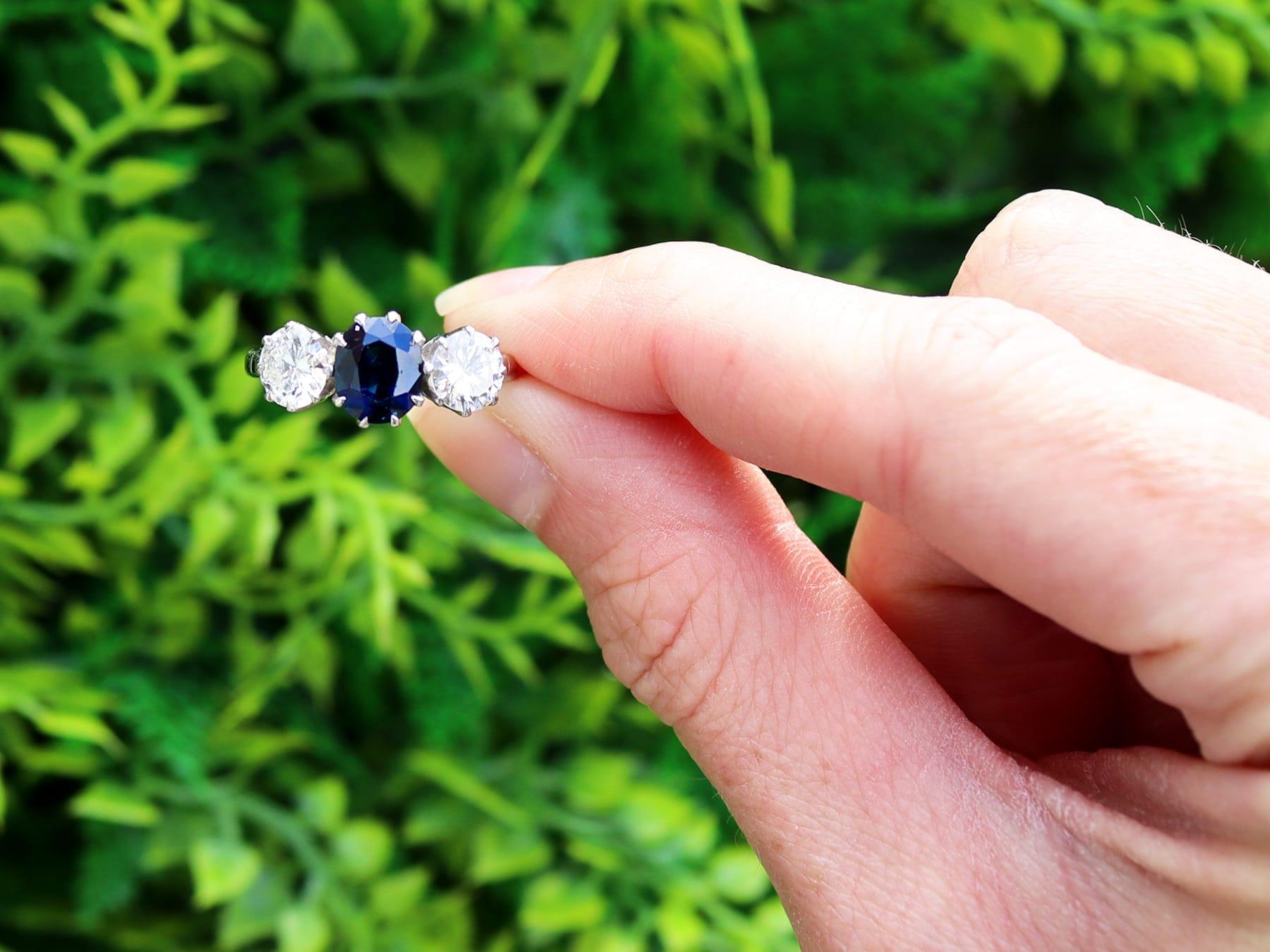 A stunning, fine and impressive antique 1.80 carat Basaltic sapphire and 1.35 carat diamond, 18 karat white gold trilogy ring; part of our diverse antique jewelry and estate jewelry collections.

This stunning, fine and impressive antique sapphire