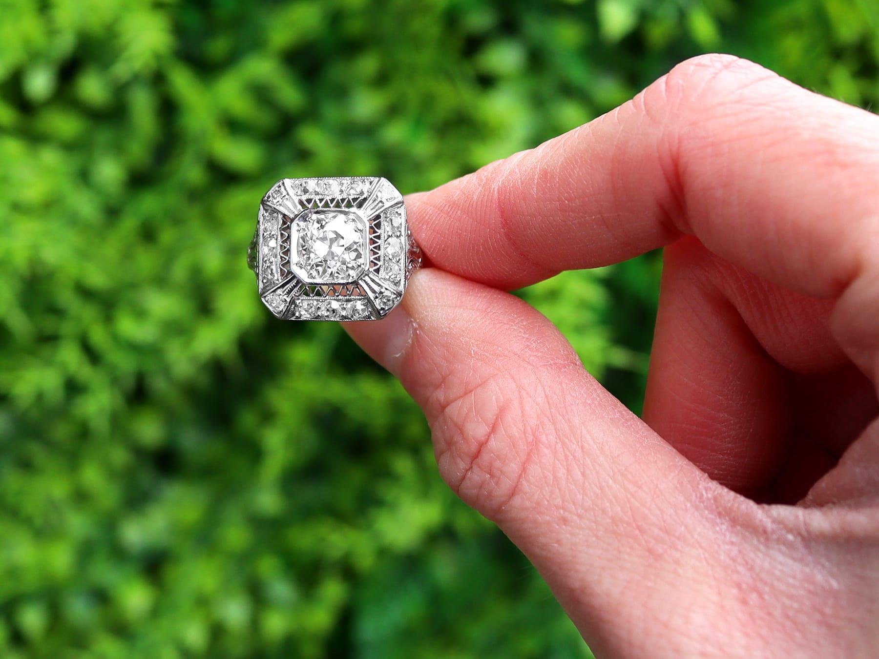 A stunning, fine and impressive antique 1.80 carat diamond and platinum dress ring; part of our diverse jewellery and estate jewelry collections.

This stunning antique 1930s diamond dress ring has been crafted in platinum.

The pierced decorated