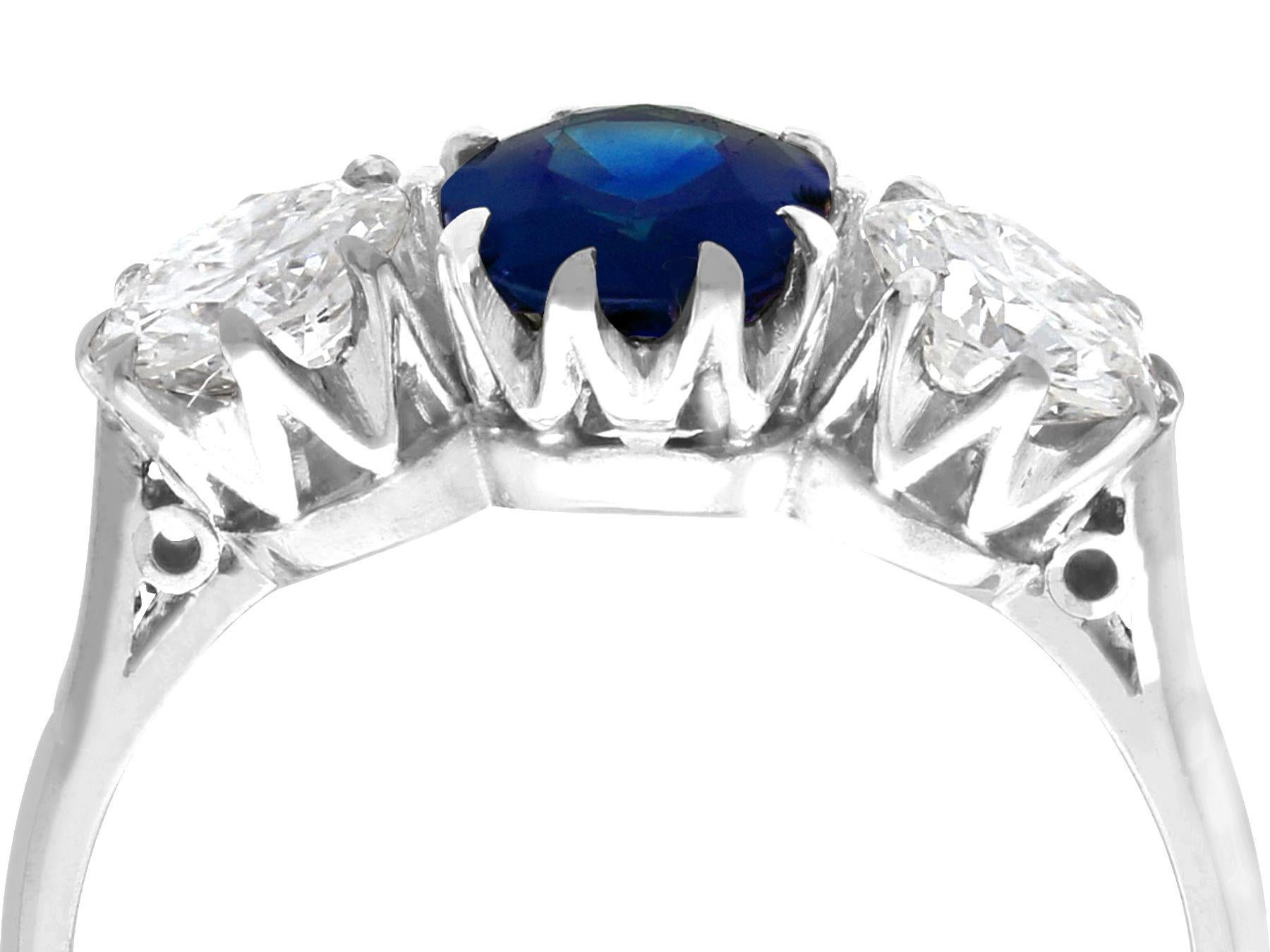 A stunning, fine and impressive antique 1.80 carat sapphire and 1.35 carat diamond, 18 karat white gold trilogy ring; part of our diverse antique jewelry and estate jewelry collections.

This stunning, fine and impressive antique sapphire and