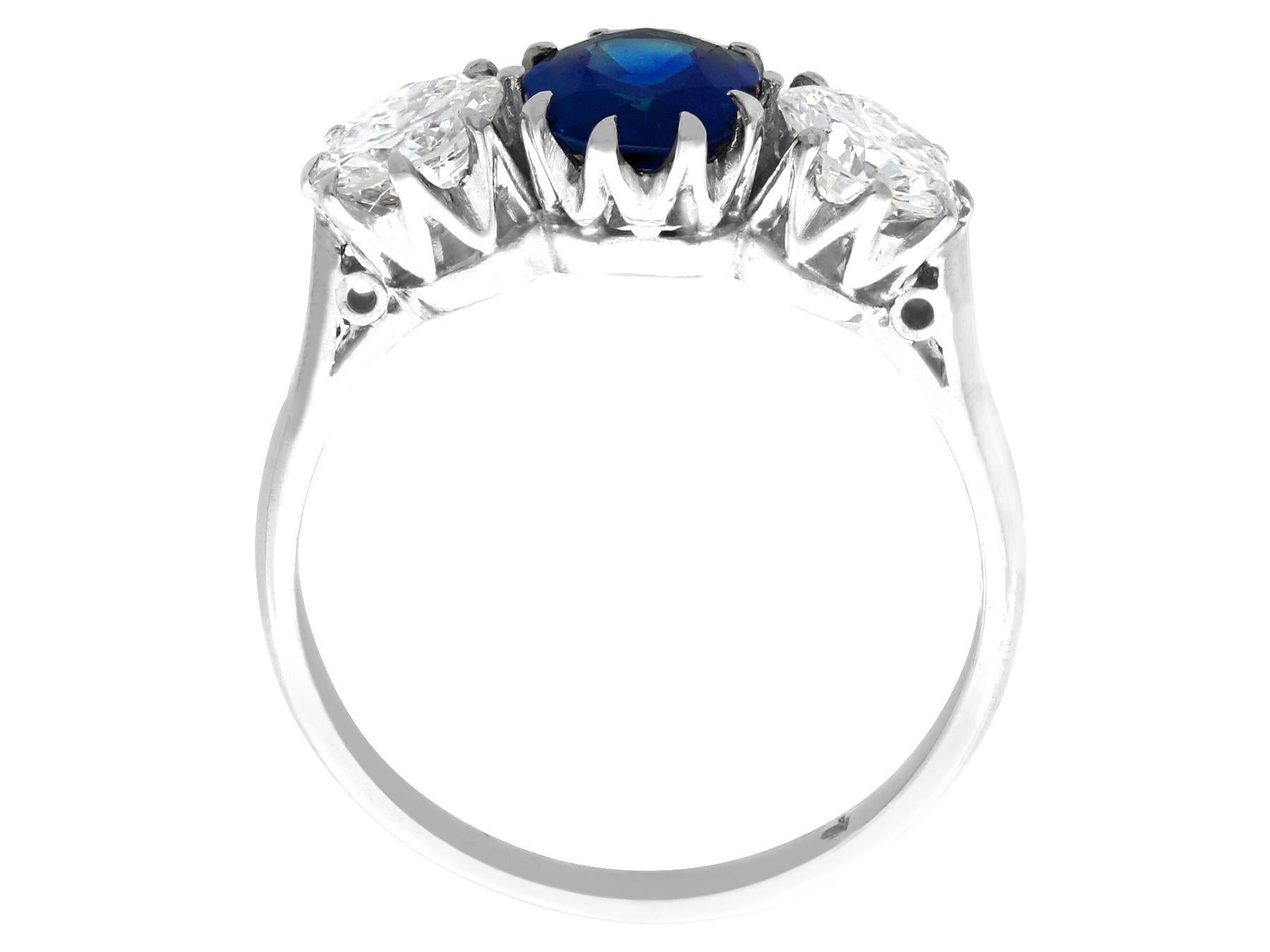 Oval Cut Antique 1.80 Carat Sapphire and 1.35 Carat Diamond White Gold Trilogy Ring For Sale