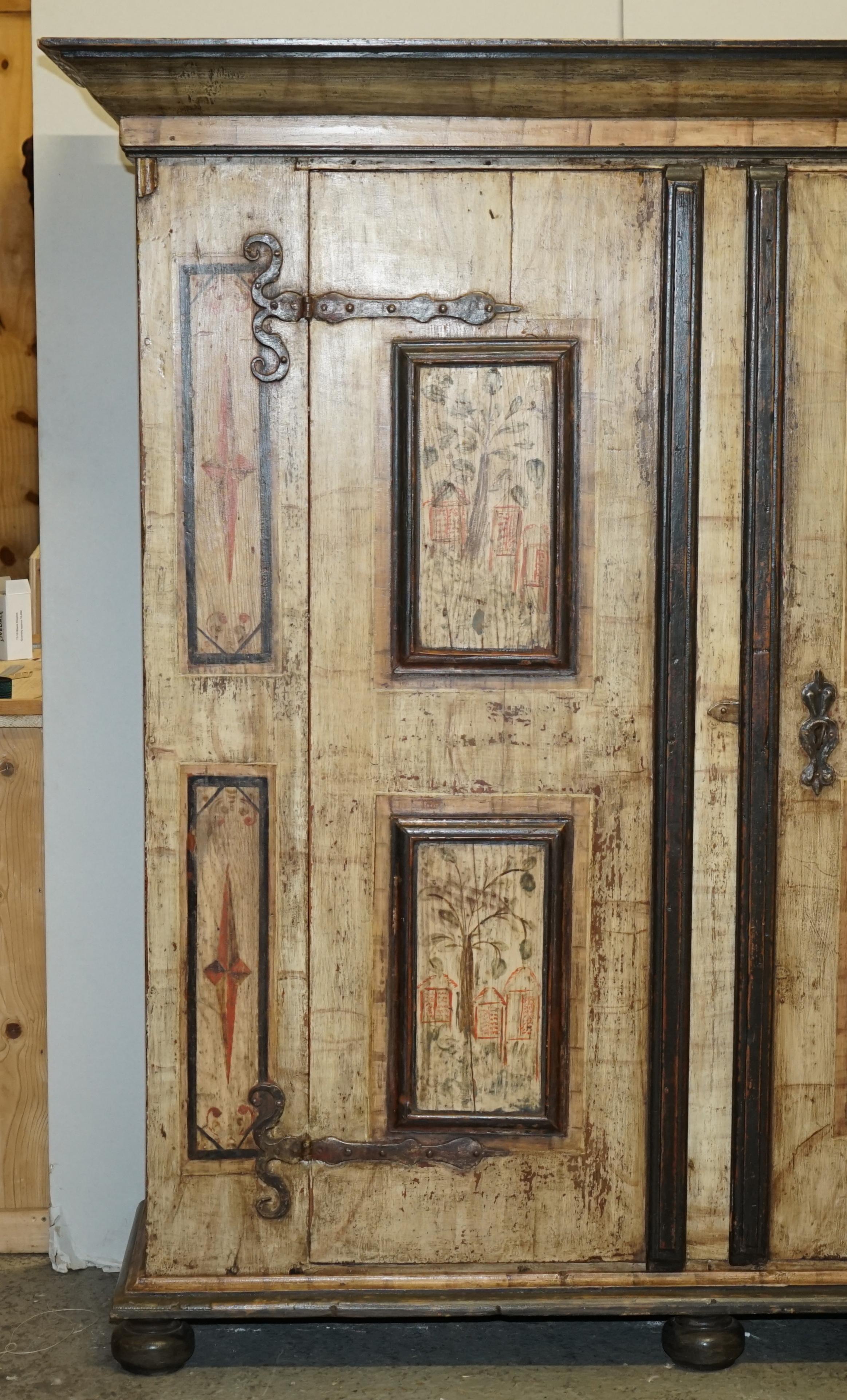 We are delighted to offer for sale this stunning, very large original 1800 Antique German Marriage wardrobe / housekeepers folded linen cupboard with super are original Tree of Life paintings and baroque stars

I have recently purchased a very
