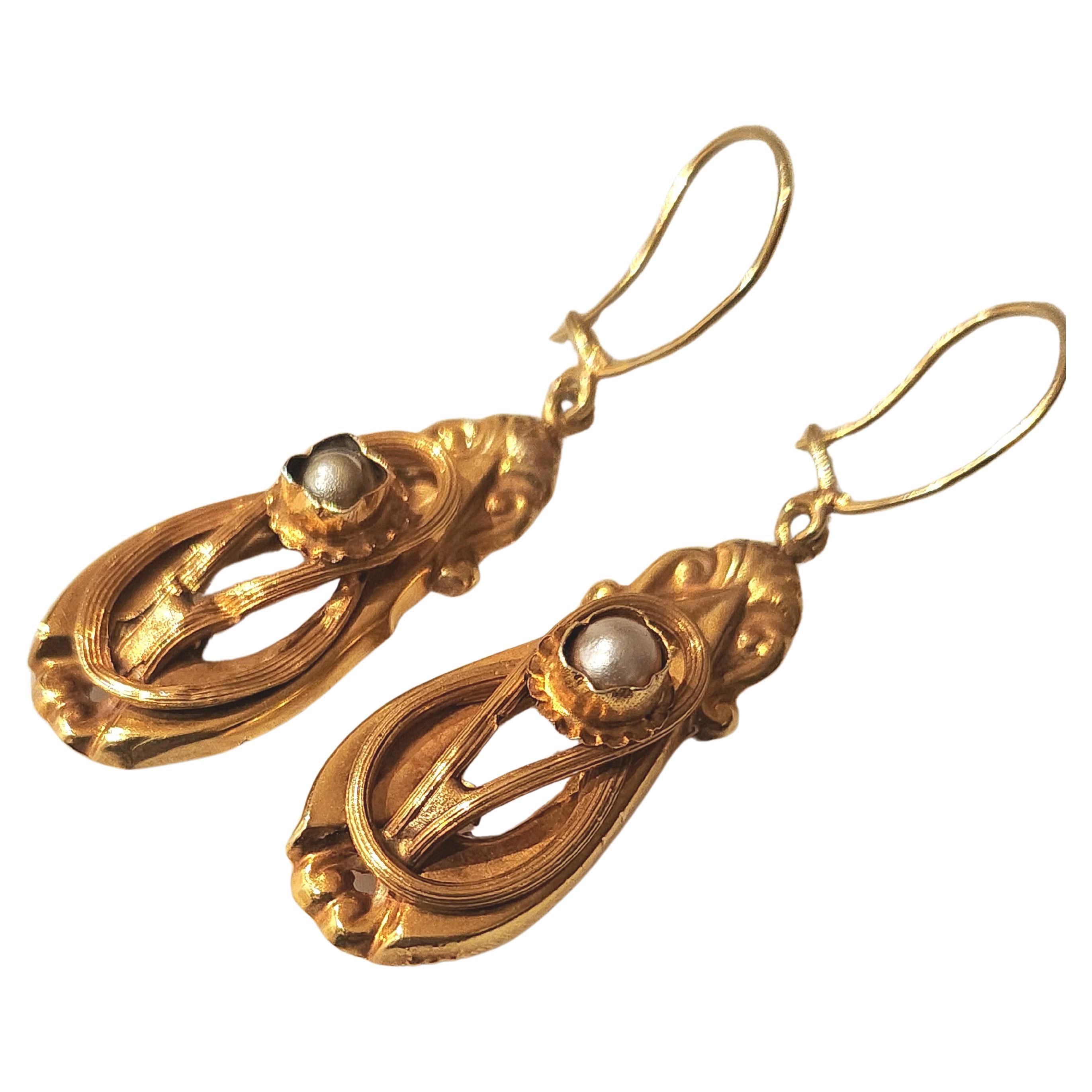 Antique 18k yellow gold biedermeier era early 19th century dangling earrings centered with 2 natural pearls with a total lenght of 5cm (earrings were gold tested 18k gold finest)