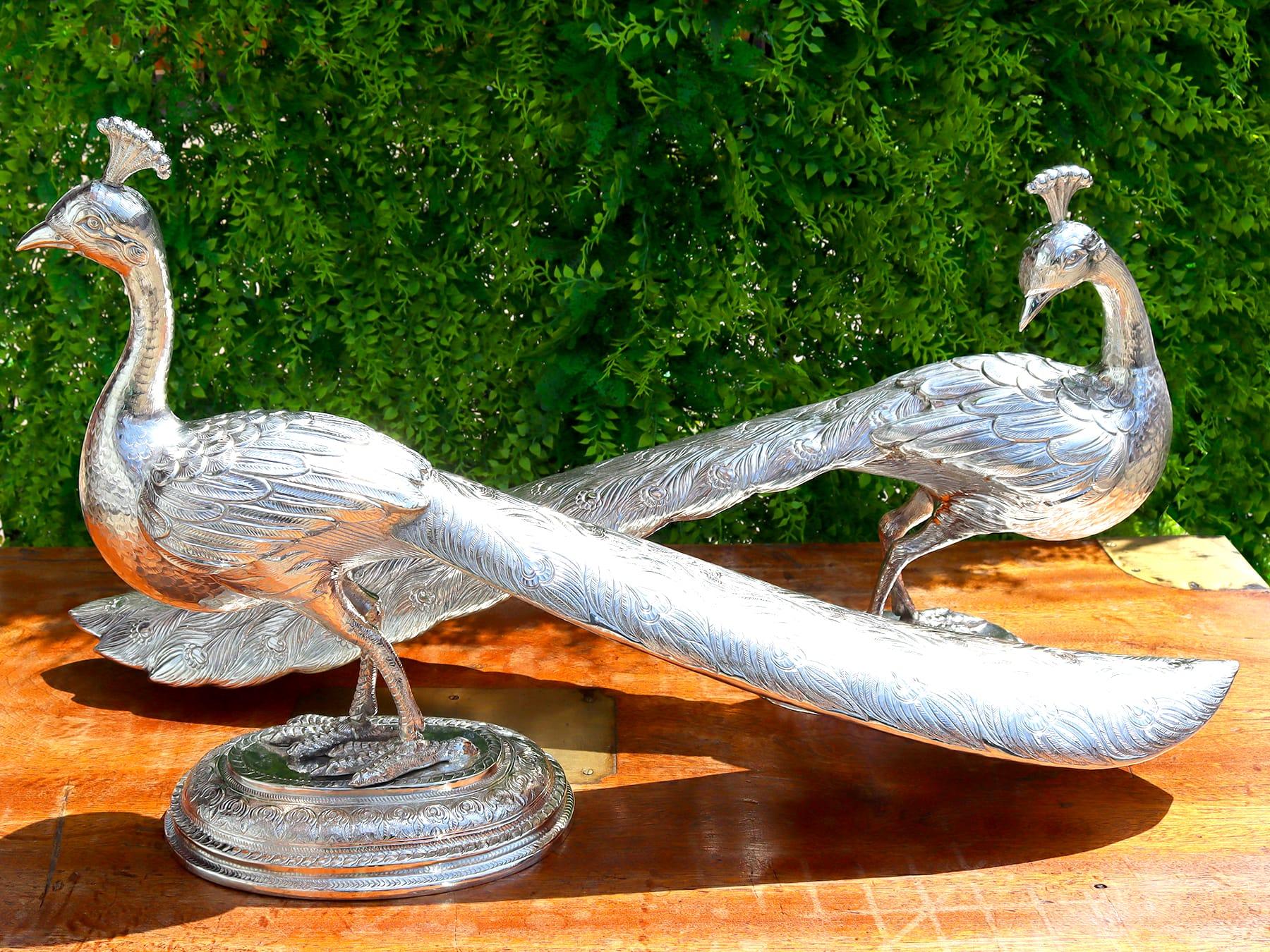 A magnificent, fine and impressive, pair of large silver bird ornaments; part of our ornamental silverware collection

These magnificent and large antique Indian silver table ornaments have been realistically modelled in the form of a pair of