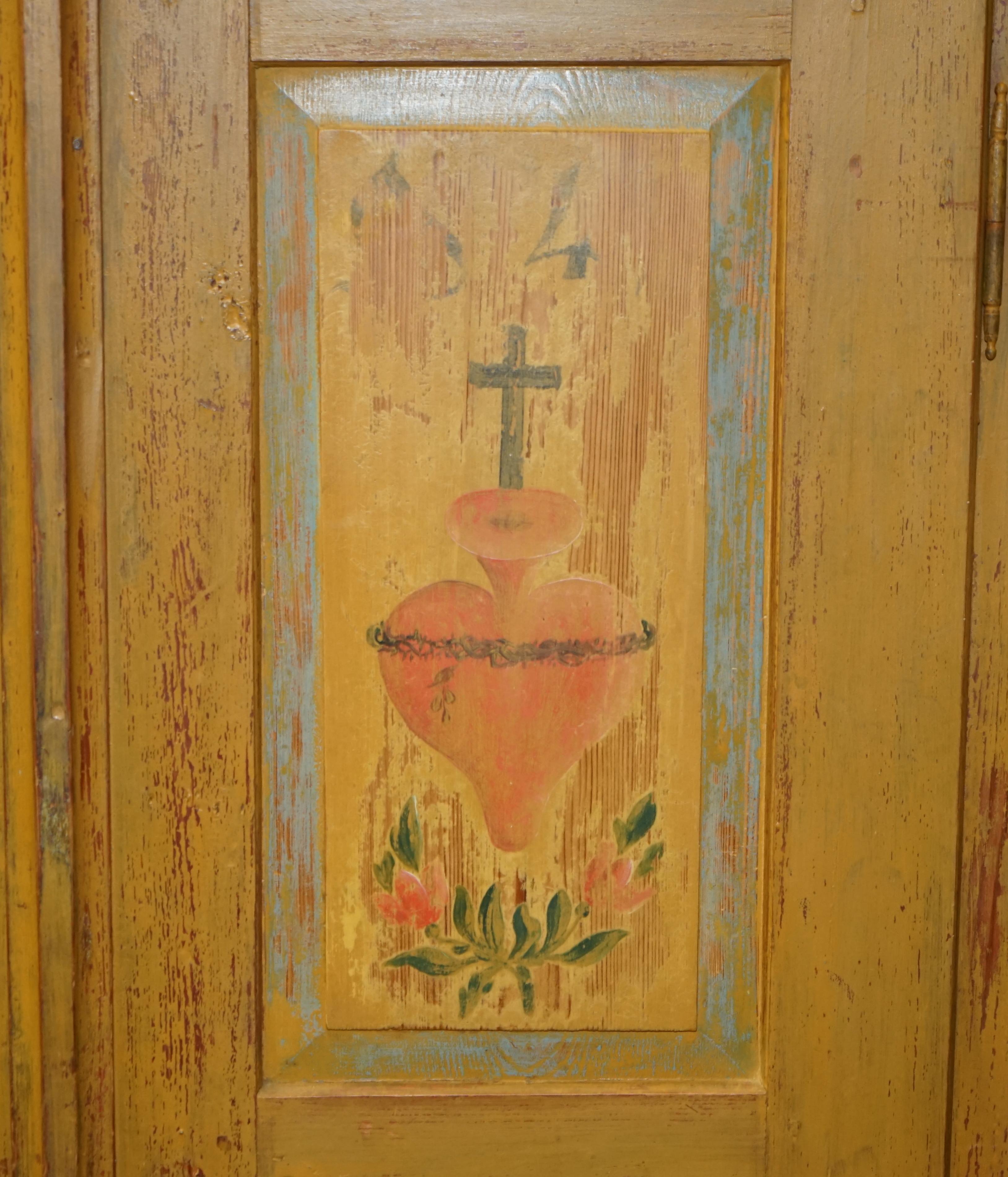 Antique 1827 Dated Holy Heart Hand Painted Housekeepers Folded Linen Wardrobe In Good Condition In West Sussex, Pulborough