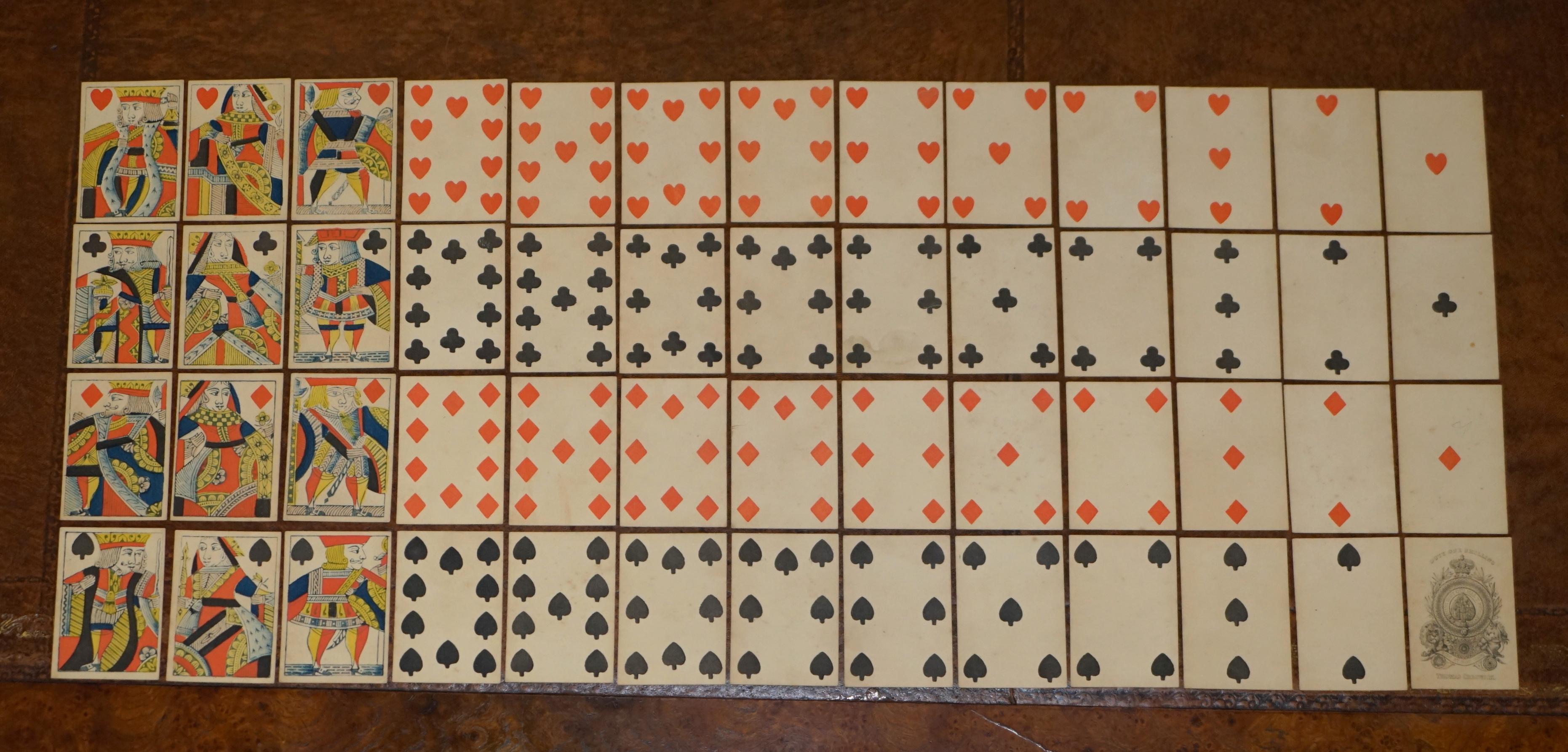 Royal House Antiques

Royal House Antiques is delighted to offer for sale this absolutely sublime original 1830 Thomas Creswick Georgian complete playing cards set with rare Fizzle Ace of spades

A truly lovely early suite, these are fine indeed,