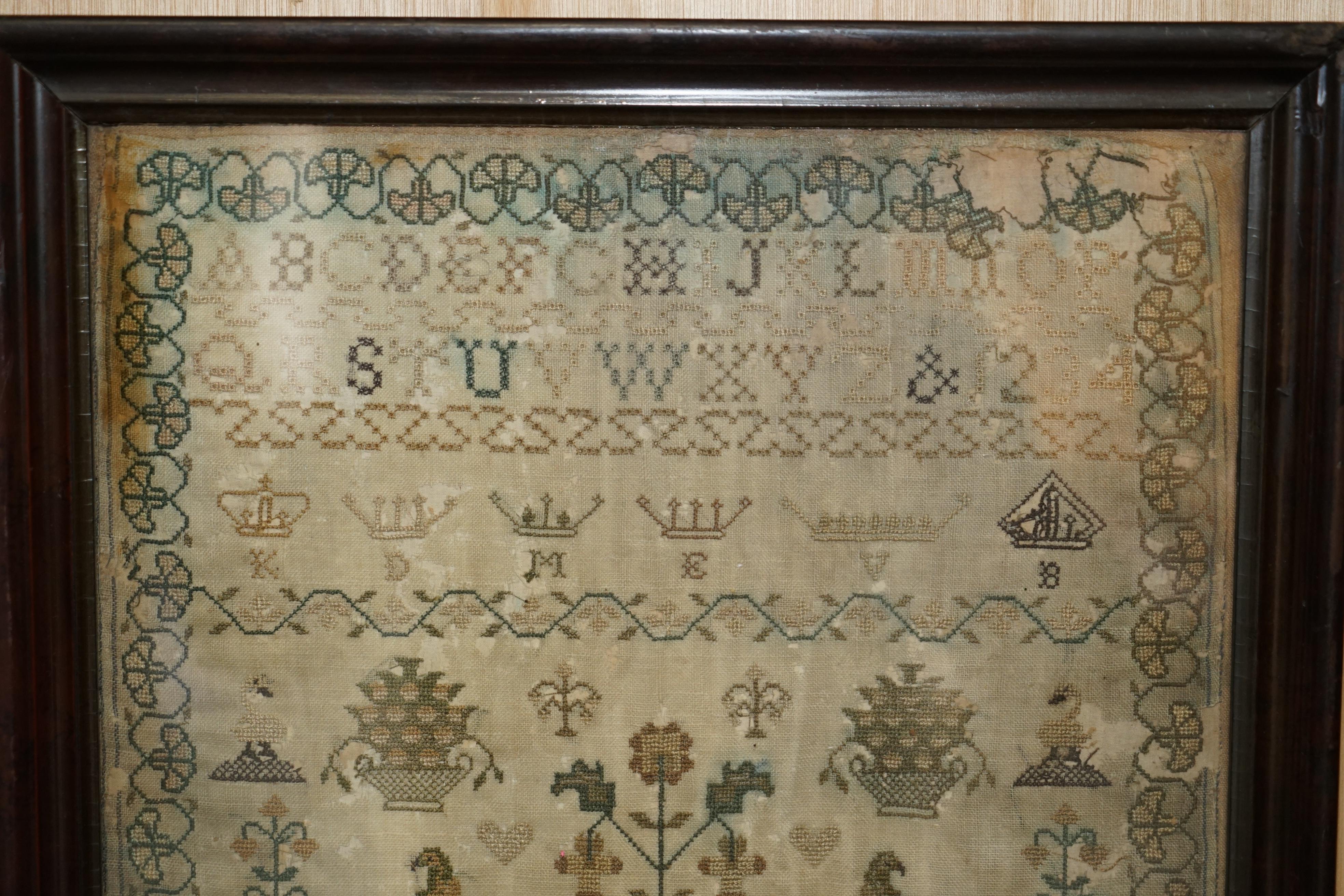 Royal House Antiques

Royal House Antiques is delighted to offer for sale this rather stunning, 1838 dated needlework sampler made in the second year of Queen Victoria's reign 

I have three others of these samplers for sale, they are dated 1830,