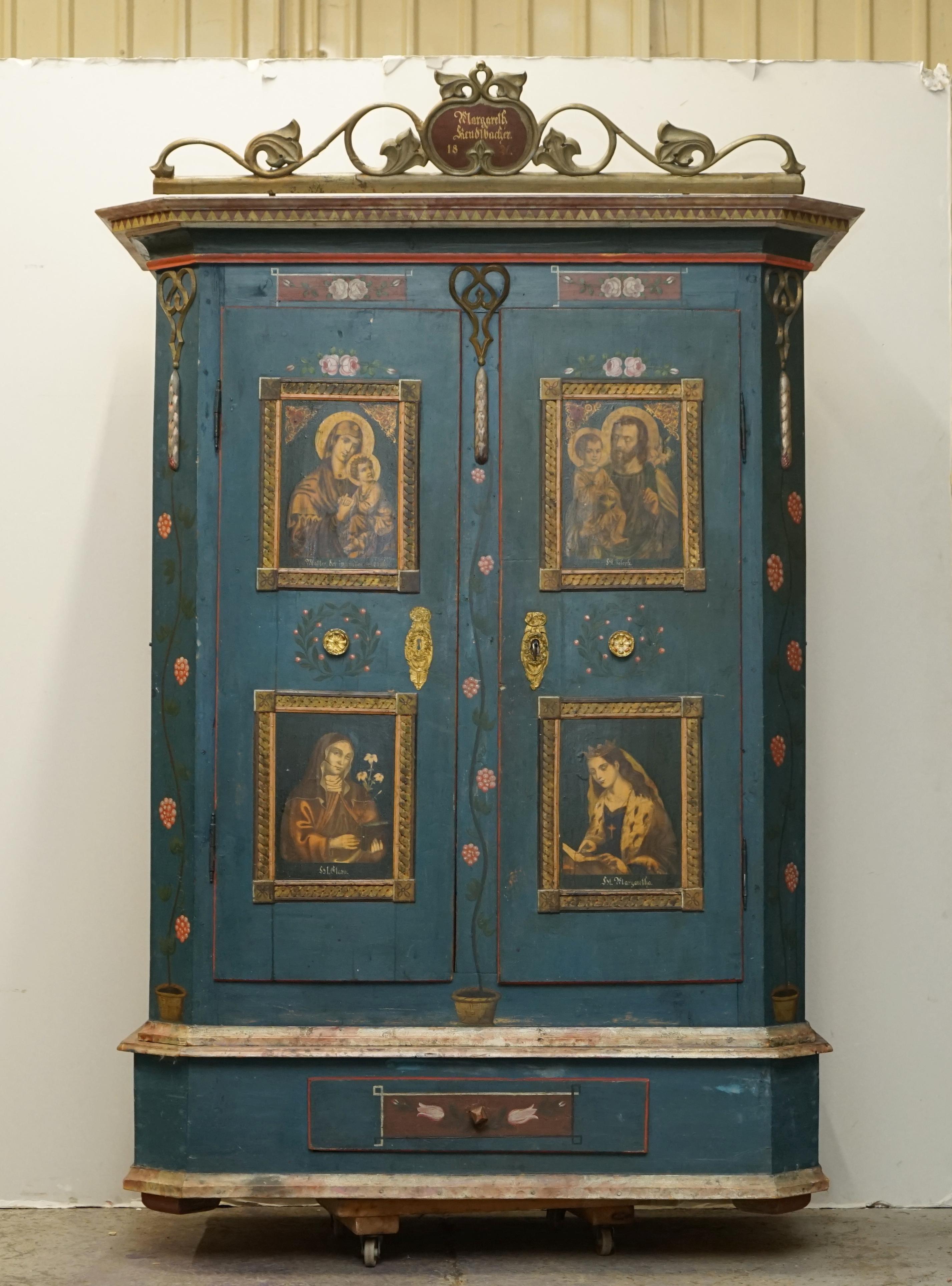We are is delighted to offer for sale this stunning original 1850 Antique German Marriage wardrobe in very a rare blue colour with Religious Icon panels and super rare 1870 giltwood pediment 

I have recently purchased a very large collection of