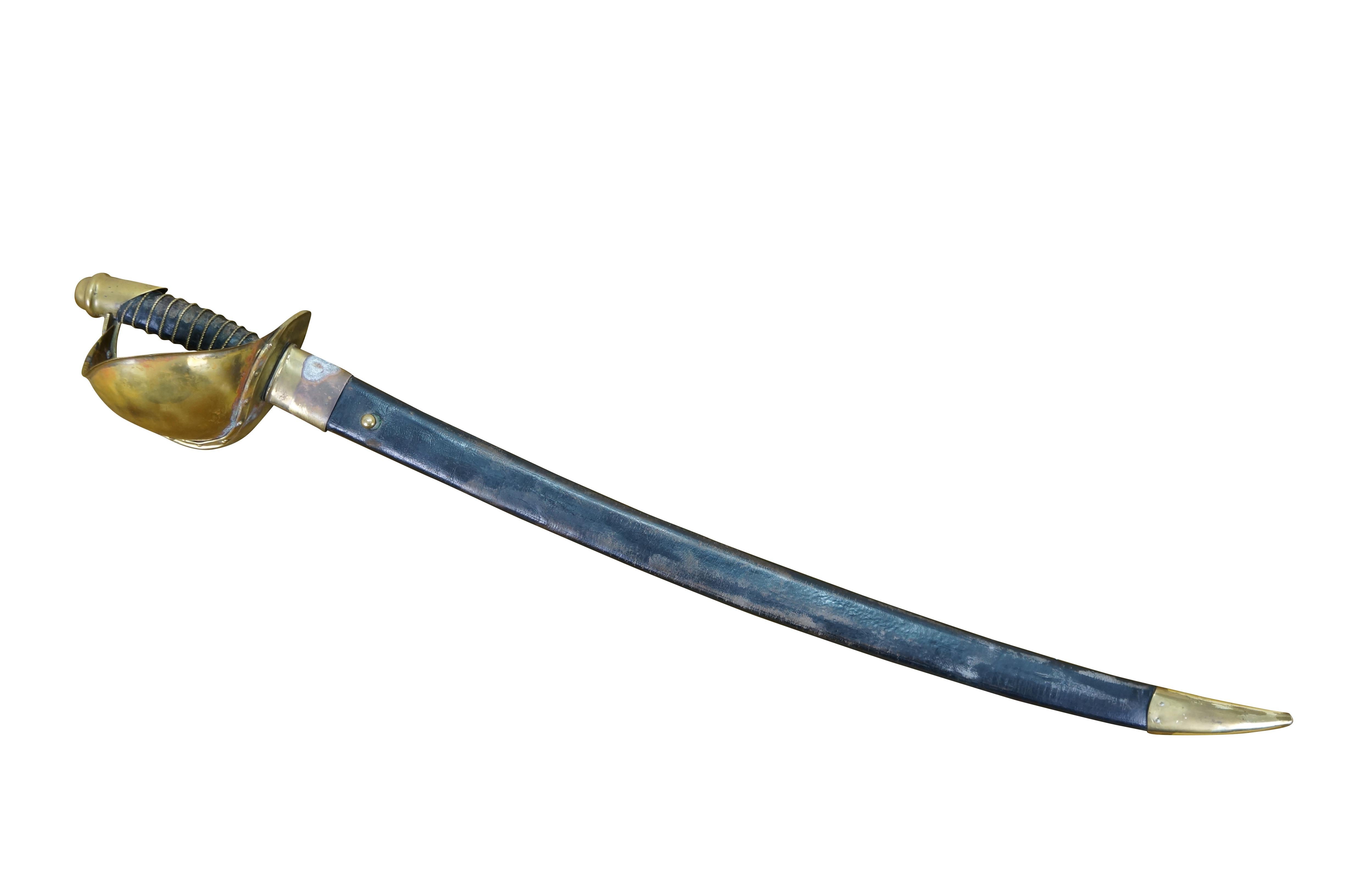 Antique Civil War Union army military M1860 United States Naval cutlass / sword.  A compact, slightly curved blade with a brass capped guard and Phrygian helmet shaped pommel framing a black shagreen leather wrapped grip with two strand twisted