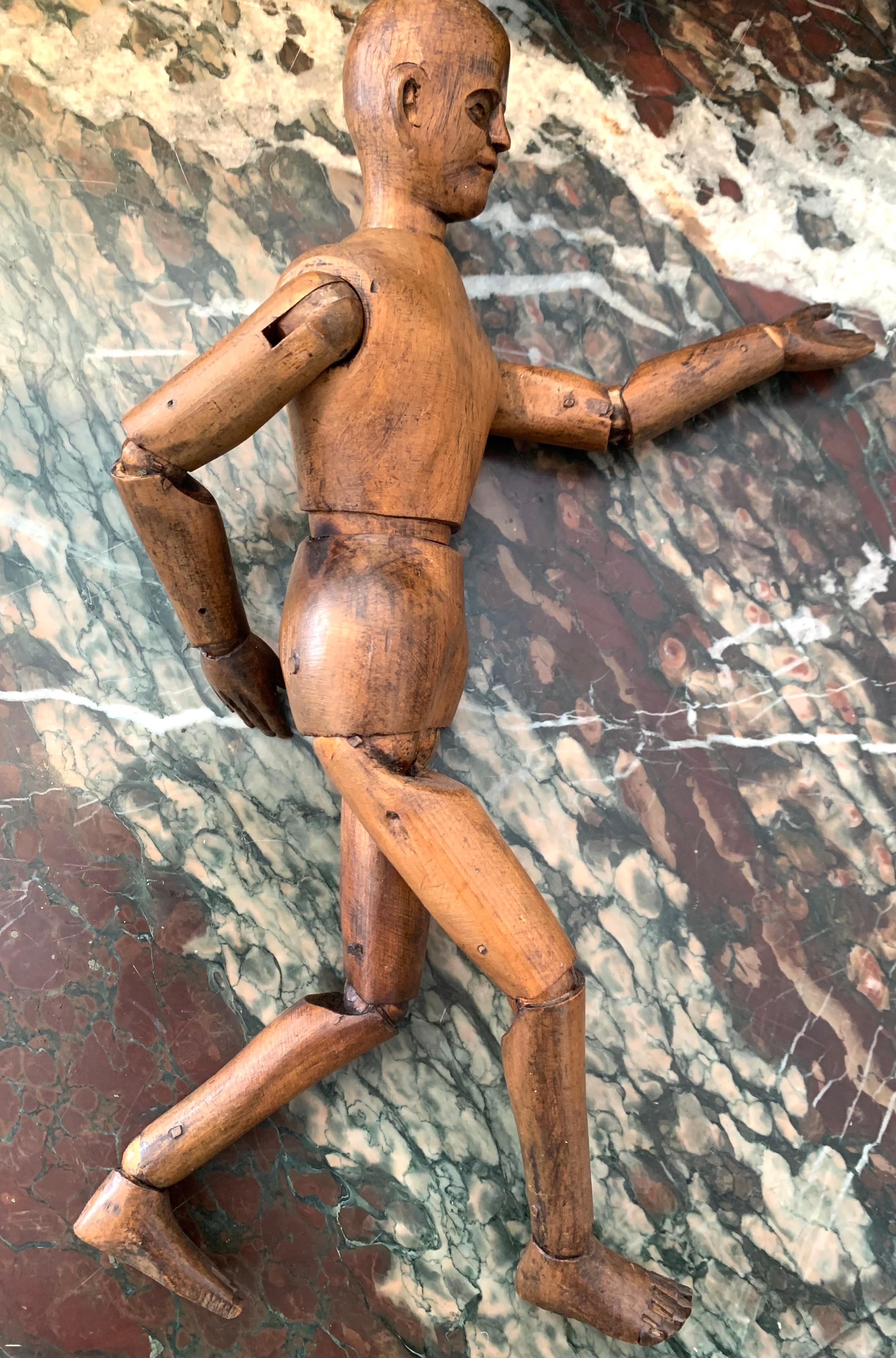 This fine featured French artist's mannequin has been carved out of spruce in the 1880's.