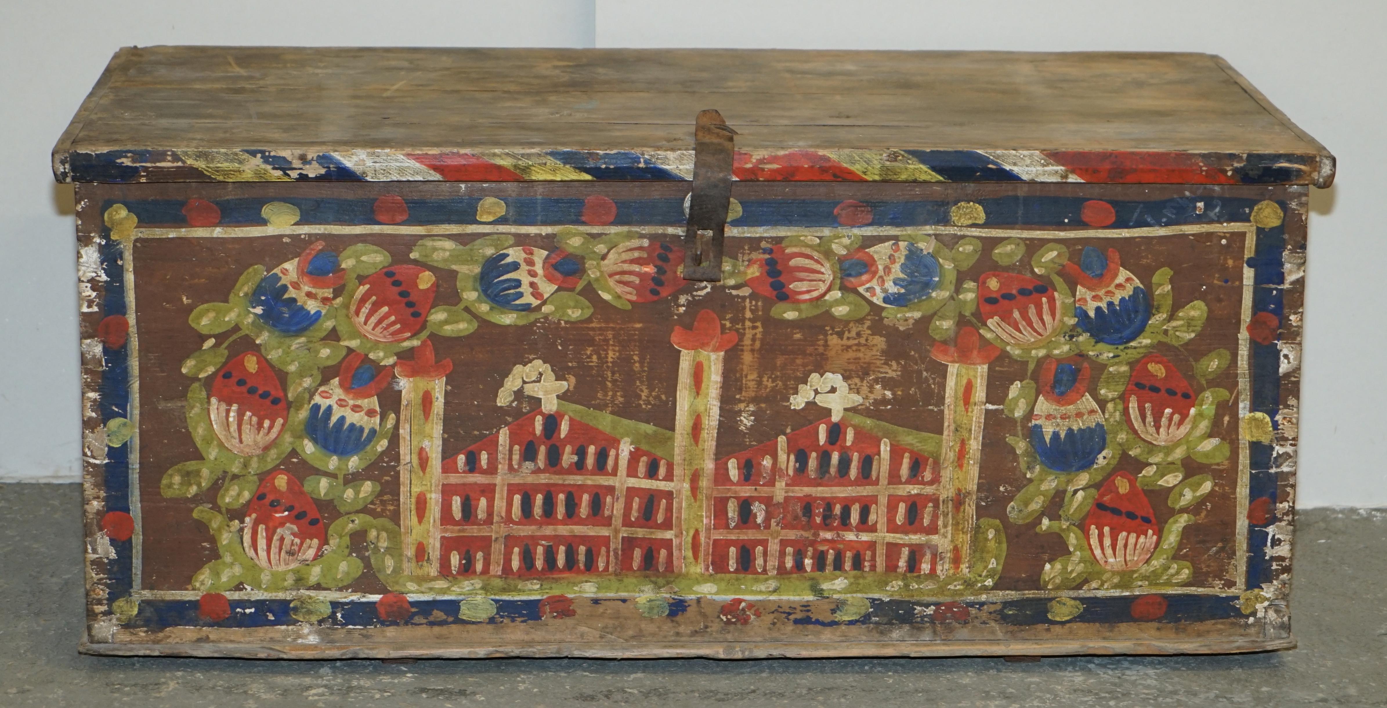 We are delighted to offer for sale this stunning, circa 1880 hand painted Romanian clothes trunk or marriage coffer chest depicting a large Church to the front.

I have recently purchased a very large collection of these original, antique painted