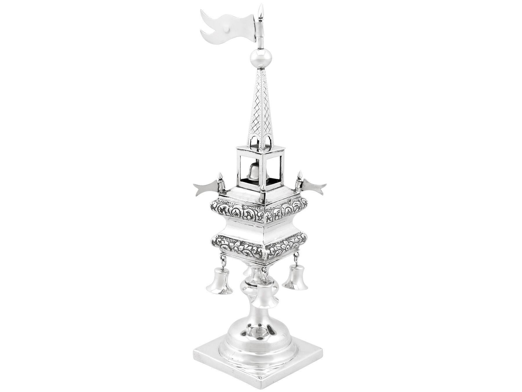 An exceptional, fine and impressive antique Russian silver spice tower; an addition to our silver Judaica collection.

This exceptional antique Russian silver spice box has been modelled in the form of a tower.

The rounded waisted shaped spice