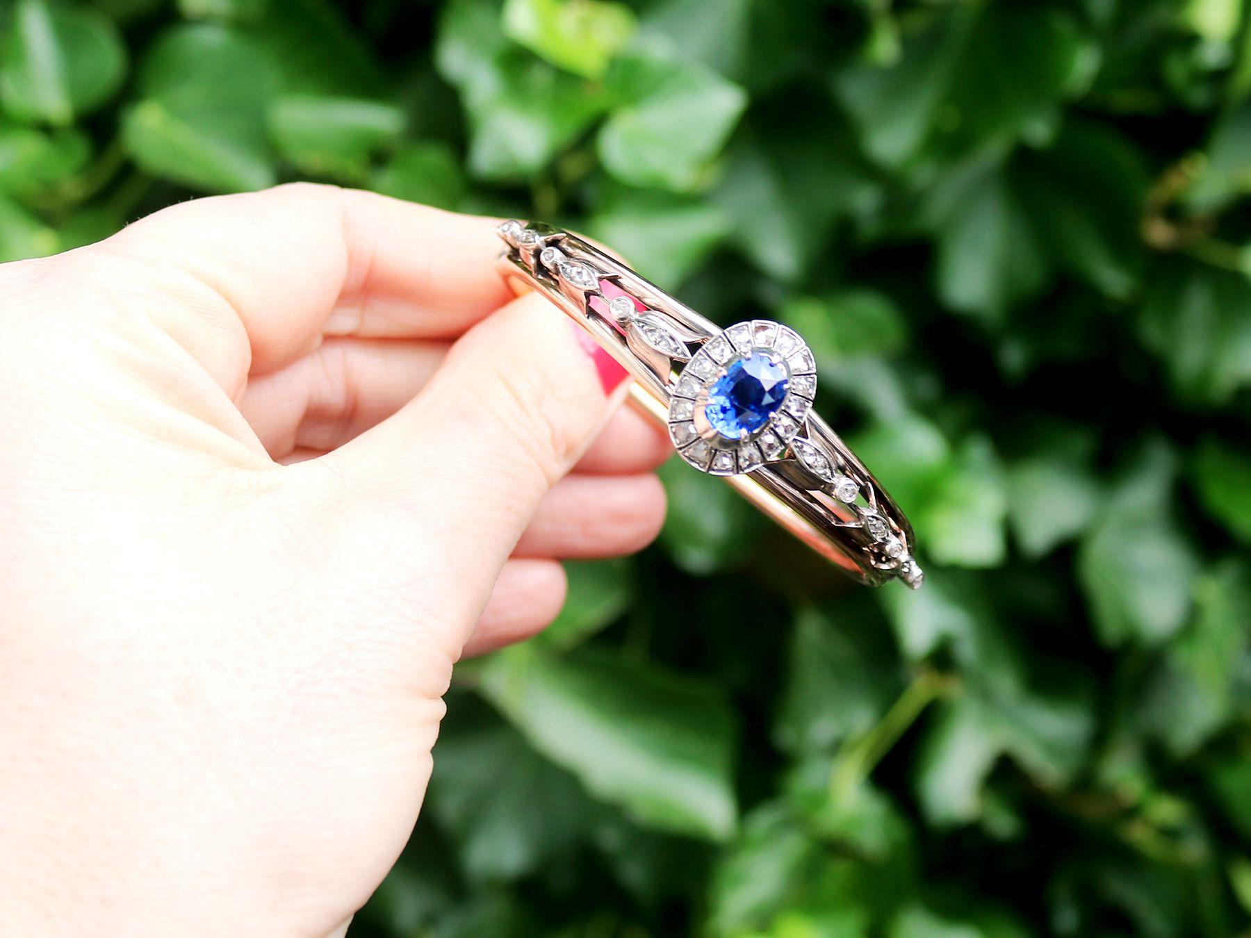 A stunning, fine and impressive Victorian 2.46 carat natural blue sapphire and 1.05 carat diamond, 14 karat rose gold and silver set bangle; part of our diverse antique jewelry and estate jewelry collections.

This stunning, fine and impressive