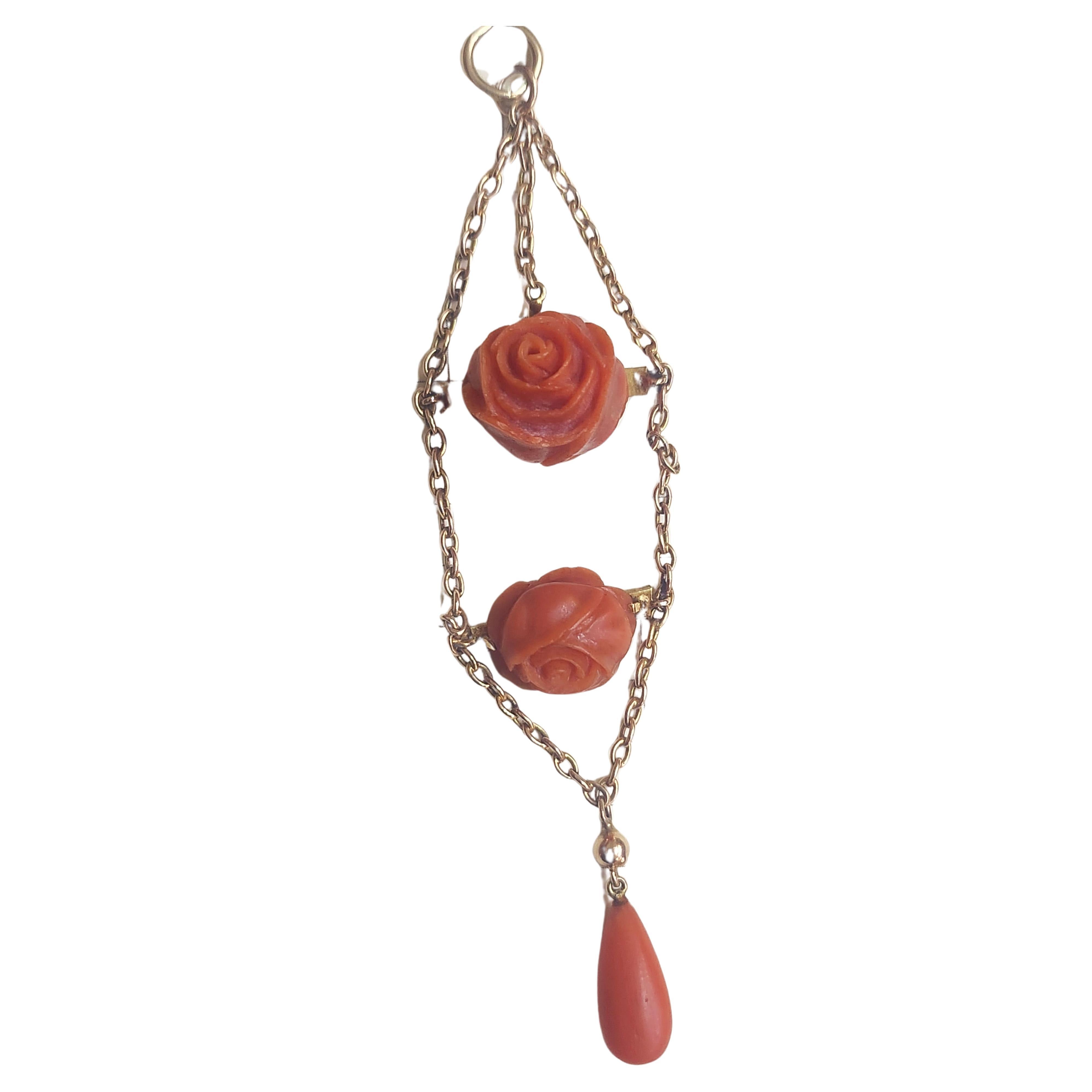 Antique 1880s 14k natural red color corals carved in flower designes attached with 14k gold movable chains total pandant lenght 9cm