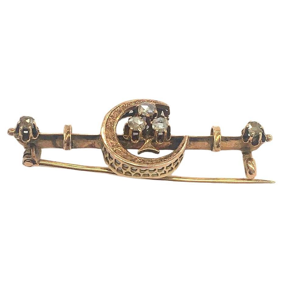 Antique early imperial russian era brooch in crescent designe decorted with rose cut diamonds brooch was made in st petersburg 1880s hall marked 56 imperial russian gold standard for 14k gold and old st petersburg assay mark before 1899s imperial