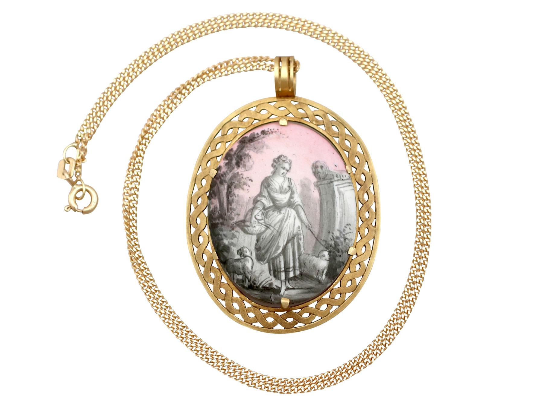 An exceptional and impressive antique French hand painted enamel and mother of pearl pendant in 18 karat yellow gold; part of our diverse antique jewelry and estate jewelry collections.

This exceptional, fine and impressive antique pendant has been
