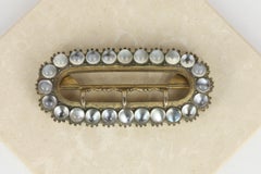 Boucle de ceinture en vermeil, cloutée de pierres de lune, datant des années 1880