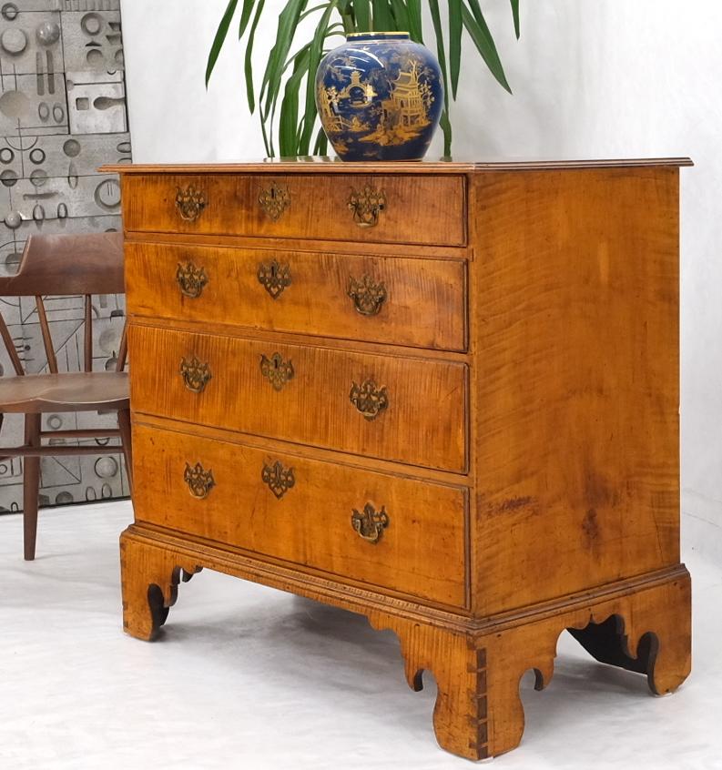 Chippendale style antique solid tiger maple chest of drawers on tall bracket shape legs. Dovetailed joints, solid boards piece with amazing patina.