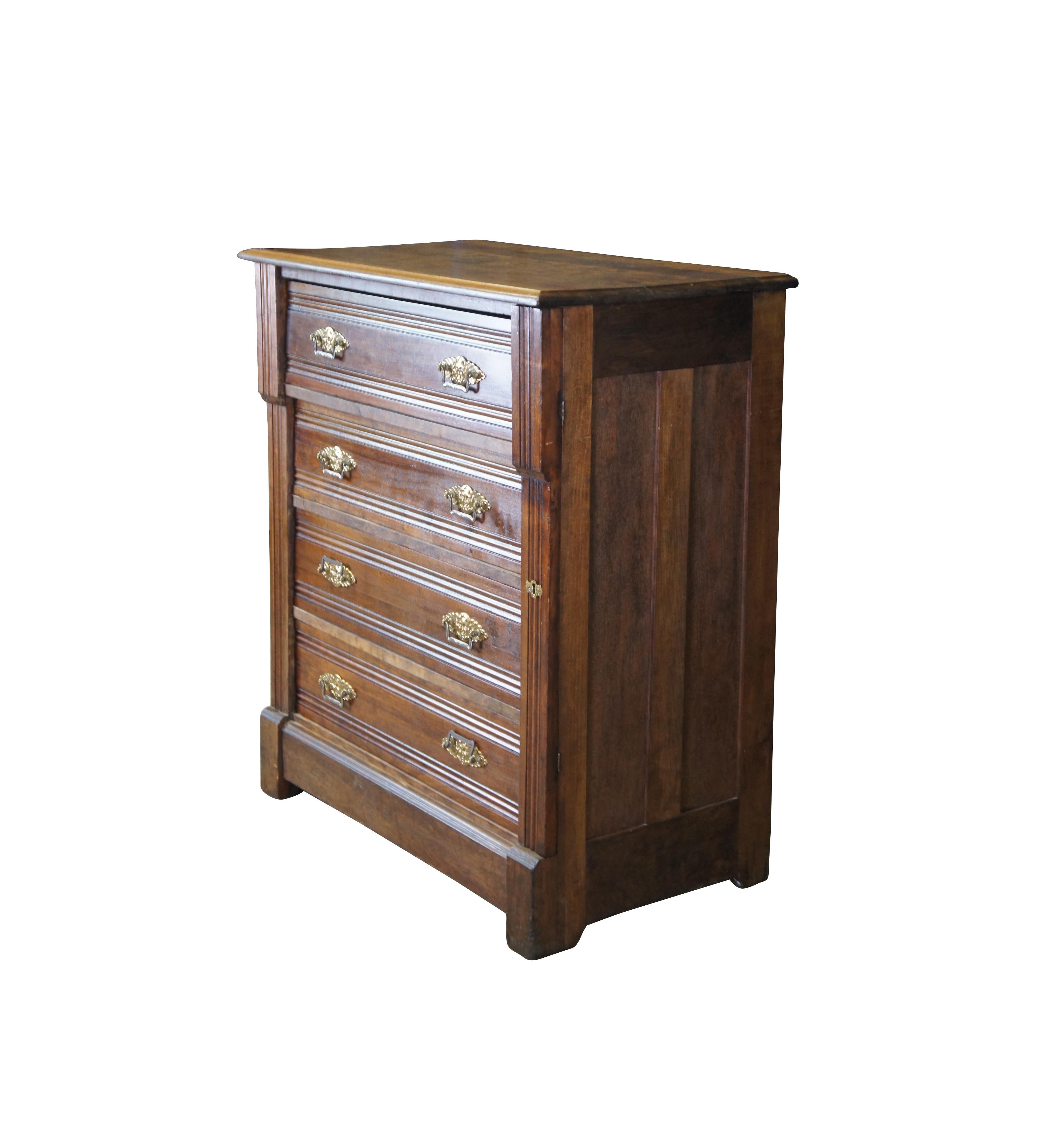 Antique Eastlake side lock chest of drawers, circa 1880s. Made of walnut featuring a side lock panel, four drawers and unique brass hardware with north wind face at the center.

This mythological Norse-like figure is a common characteristic of a