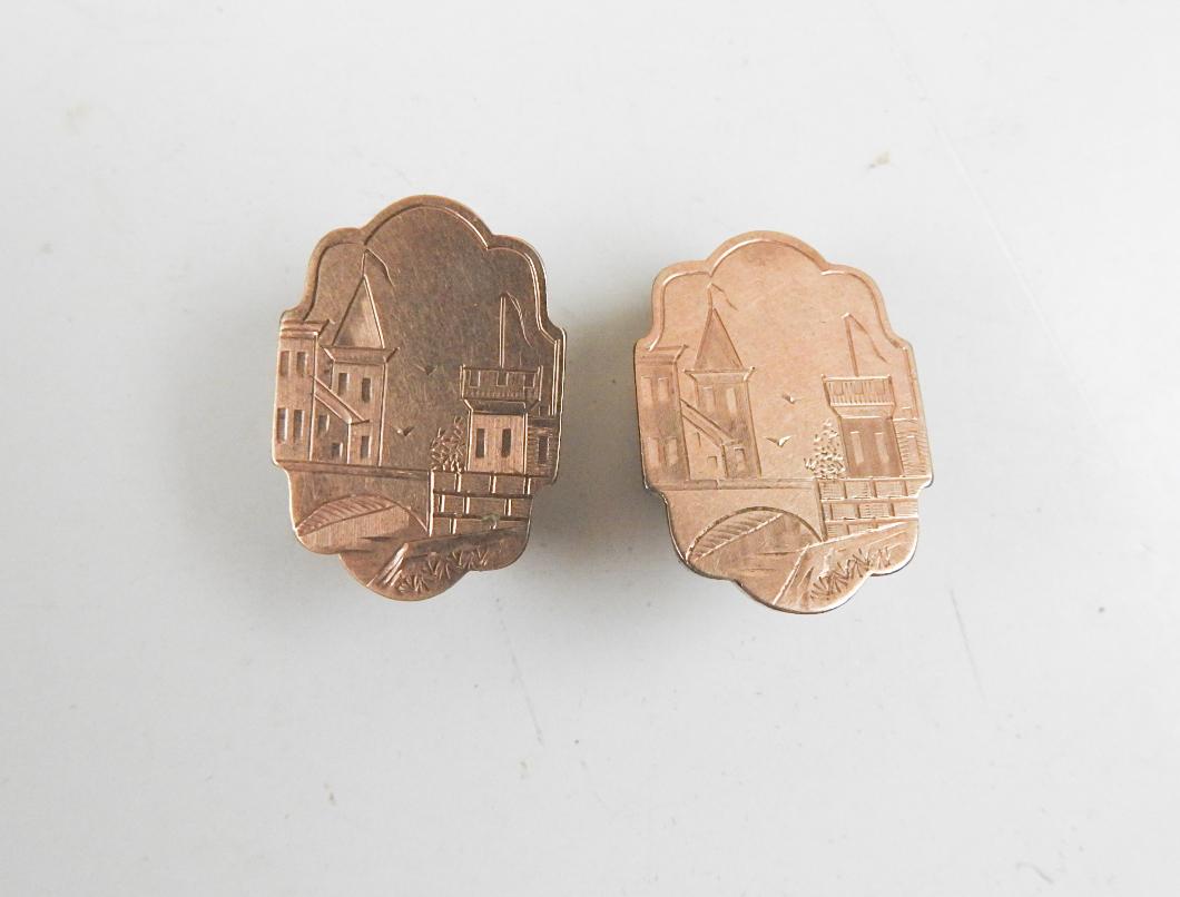 Antique circa 1880's gilded age gold filled engraved cufflinks.  Detailed engraving has castle, birds, flags, bridge on a cartouche shape.  Back buttons flip up and still have good action.  Surface in very good condition, wear to button back, old
