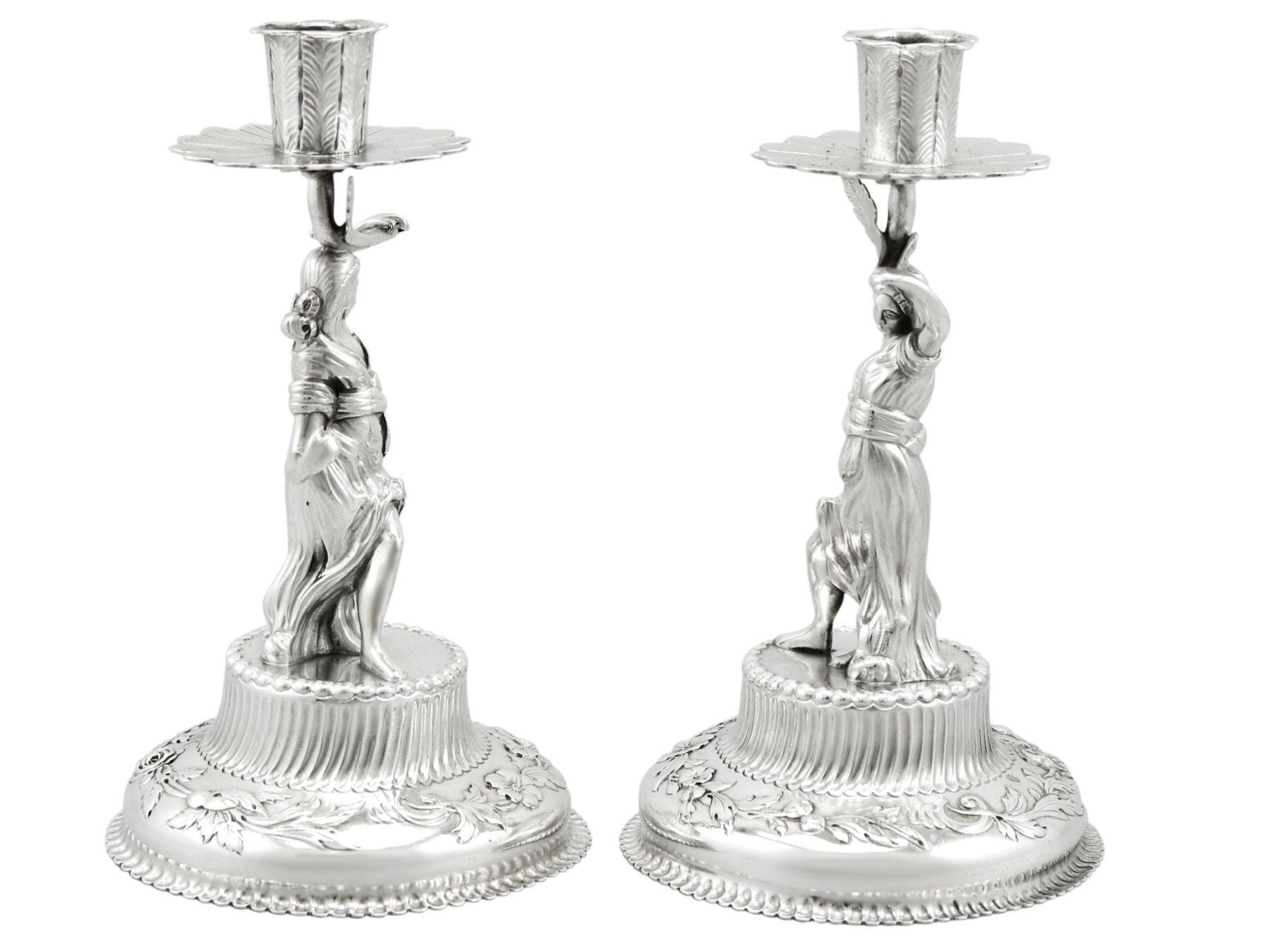 An exceptional, fine and impressive pair of antique Victorian English sterling silver tapersticks made by Walter & John Barnard; an addition of our ornamental silverware collection.

These exceptional antique Victorian Walter & John Barnard