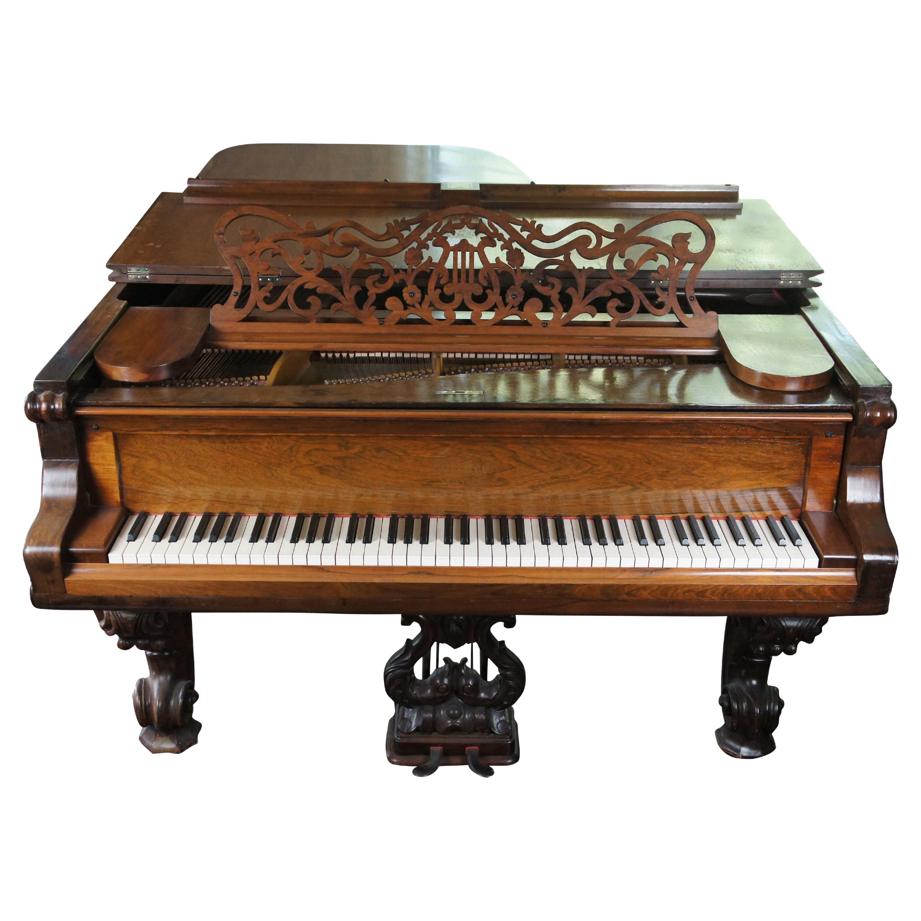 Antique Weber grand piano, circa 1880s.  Made of Rosewood with Baroque and Rococo styling.  An elaborate case with serpentine trim, acanthus foliate and scrolling detail.  The piano is supported by robust cabriole legs with scrolled feet.  Each leg