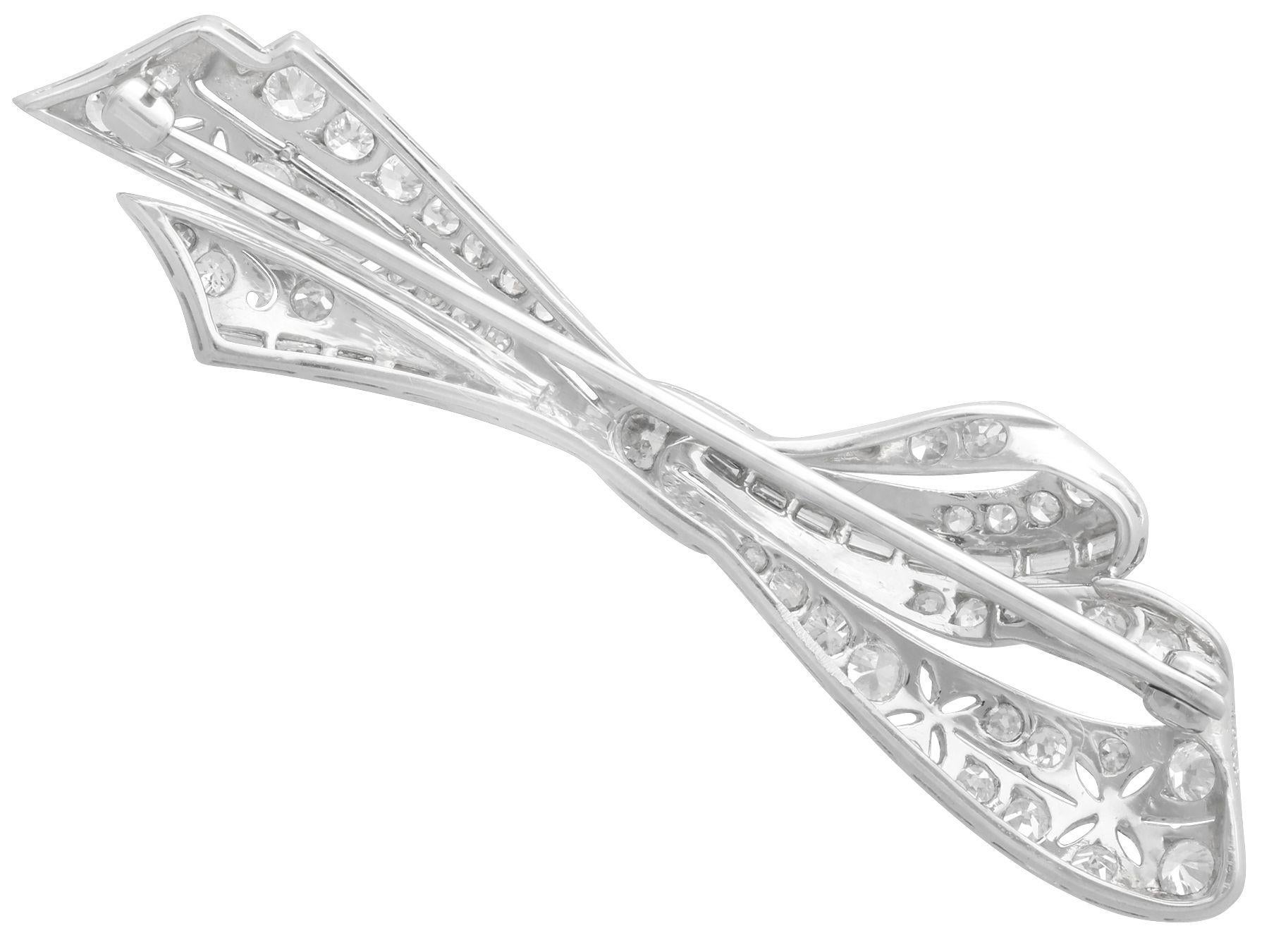 Women's or Men's Antique 1.89 Carat Diamond and Platinum Bow Brooch Circa 1930 For Sale