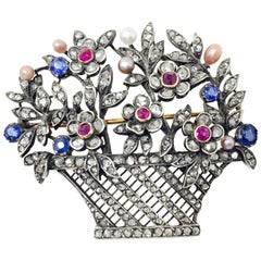 Broche ancienne en or 14 carats avec diamants blancs, saphirs bleus, perles et rubis, 1890-1910