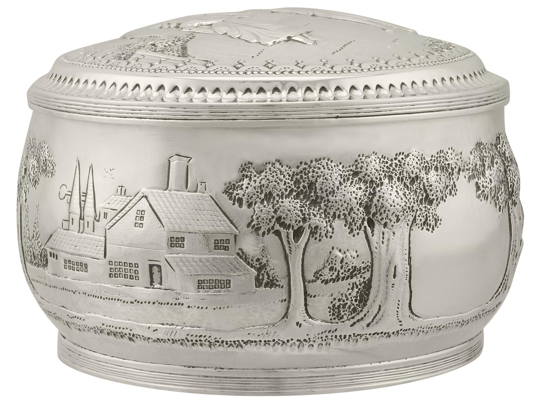 An exceptional, fine and impressive antique Dutch silver box, an addition to the ornamental silverware collection.

This exceptional antique Dutch silver box has circular rounded form.

The body of the box is embellished with embossed decoration